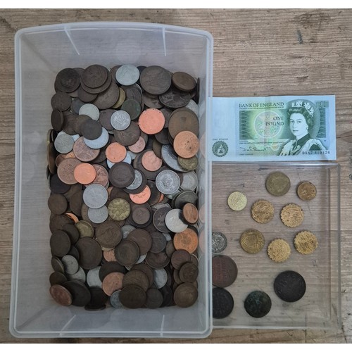 A box of assorted world coins