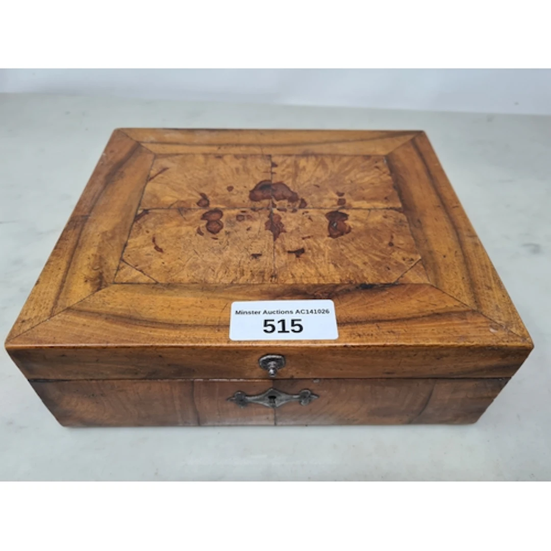 An antique walnut with cross-banded hinged lid, 9 x 7in