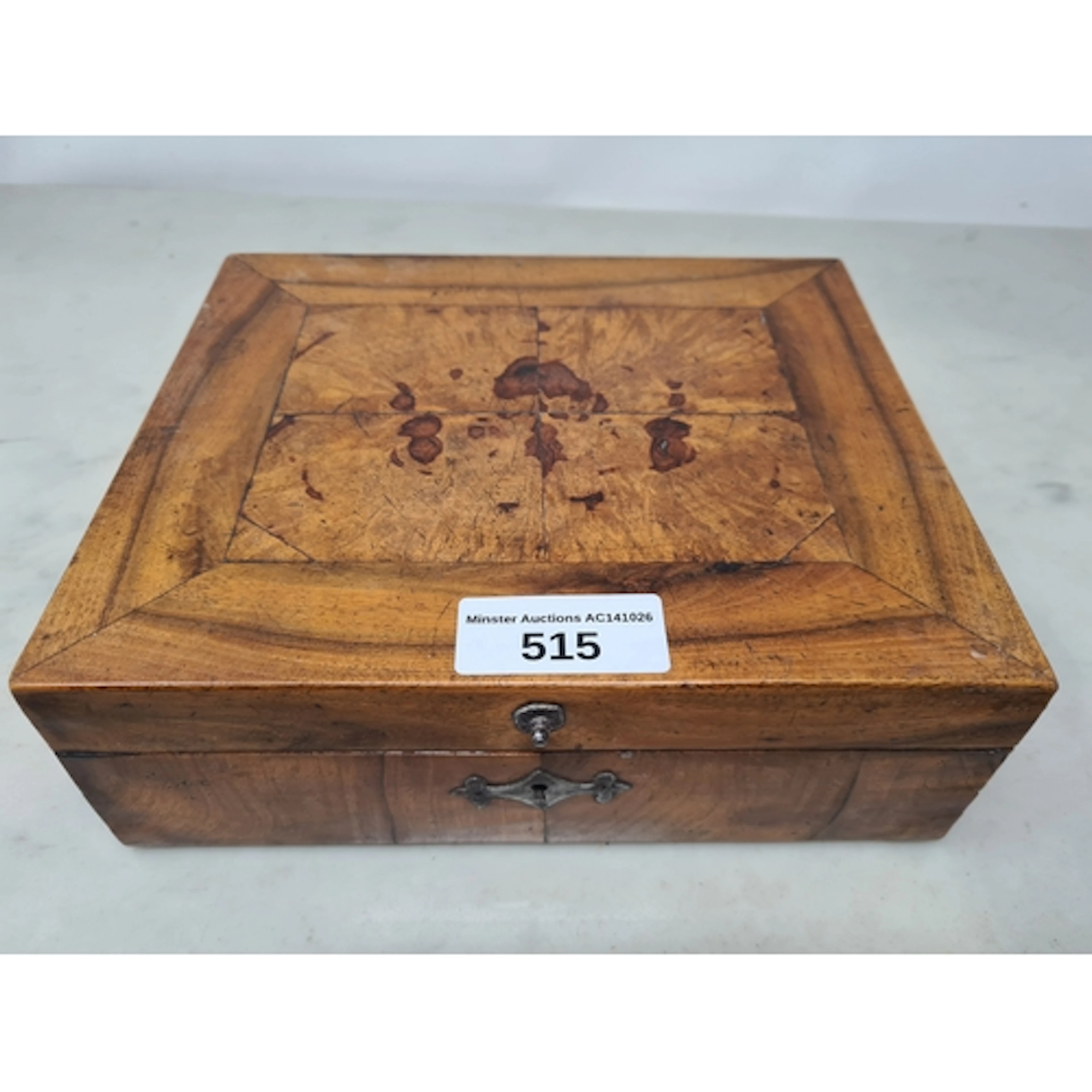 An antique walnut with cross-banded hinged lid, 9 x 7in