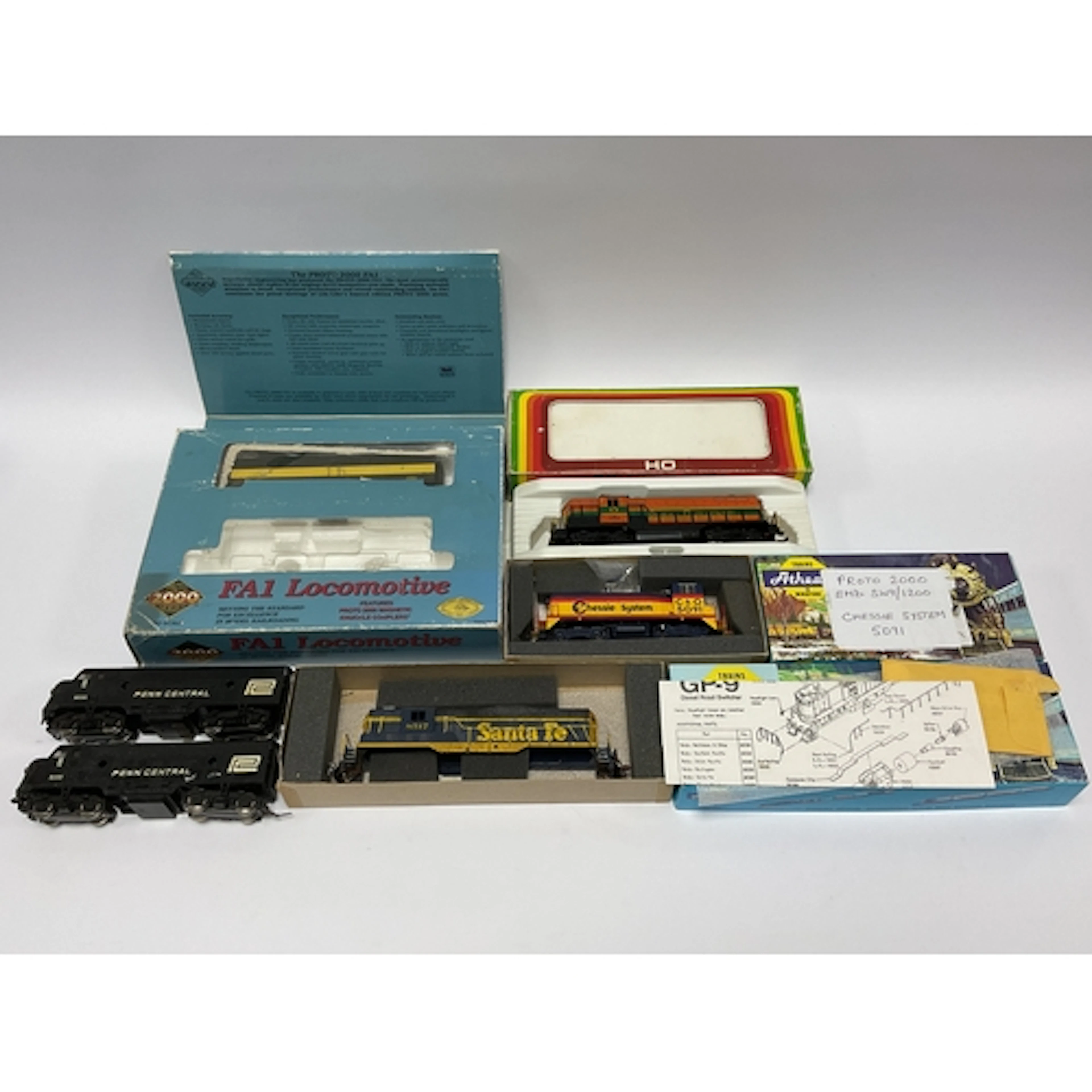 Five HO scale American outline diesel locomotives: a Seaboar...