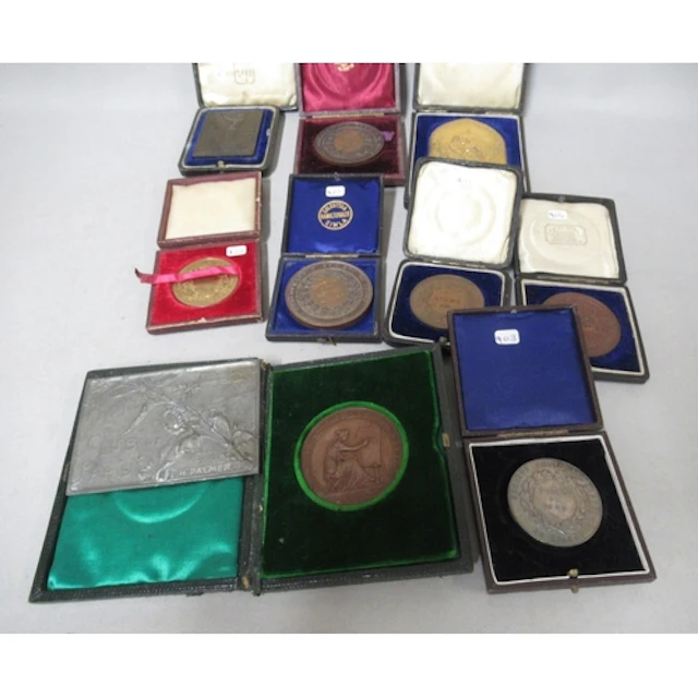 Quantity of 19th Century cased bronze medallions, photograph...