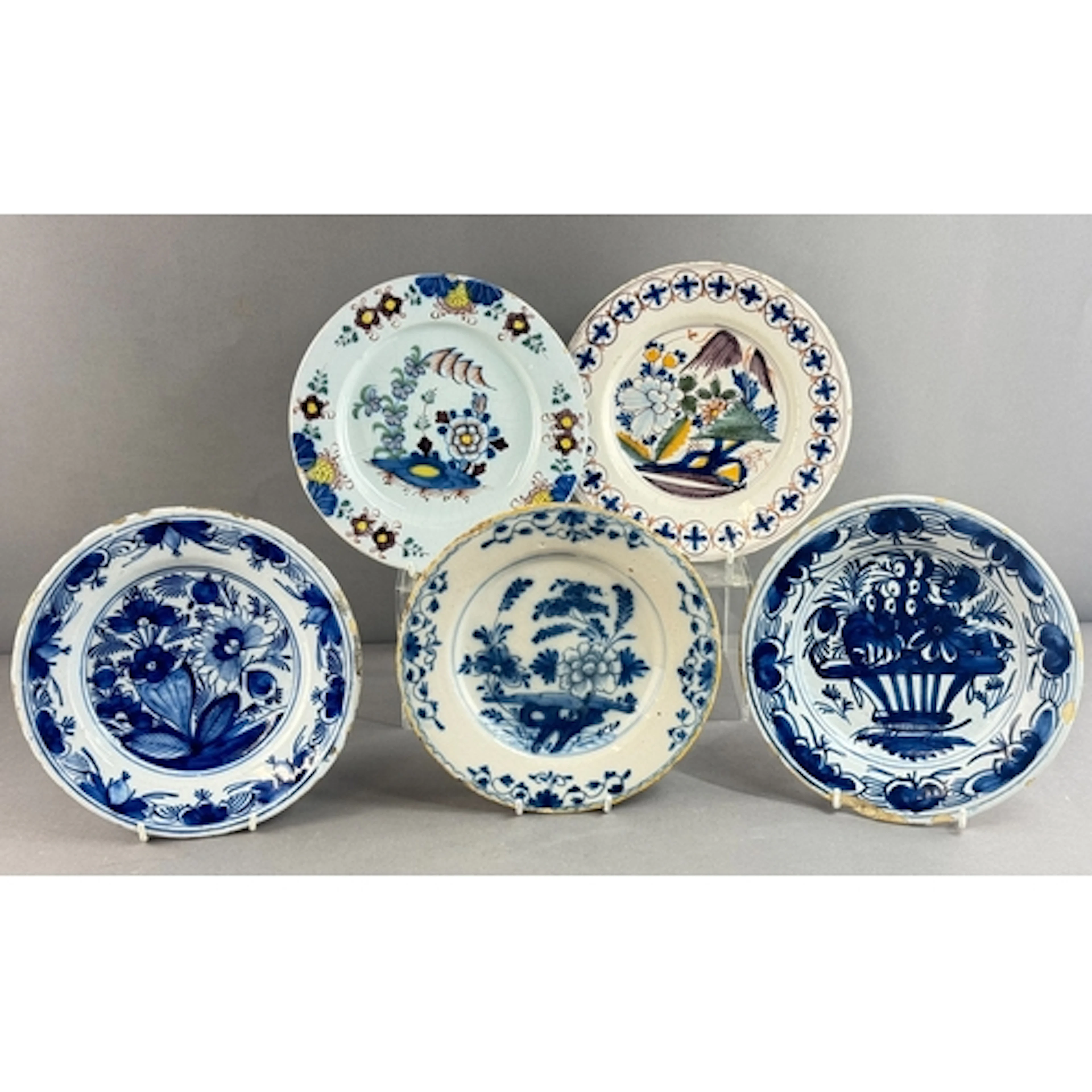 Five Delftware plates, Dutch and English, mostly 18th centur...