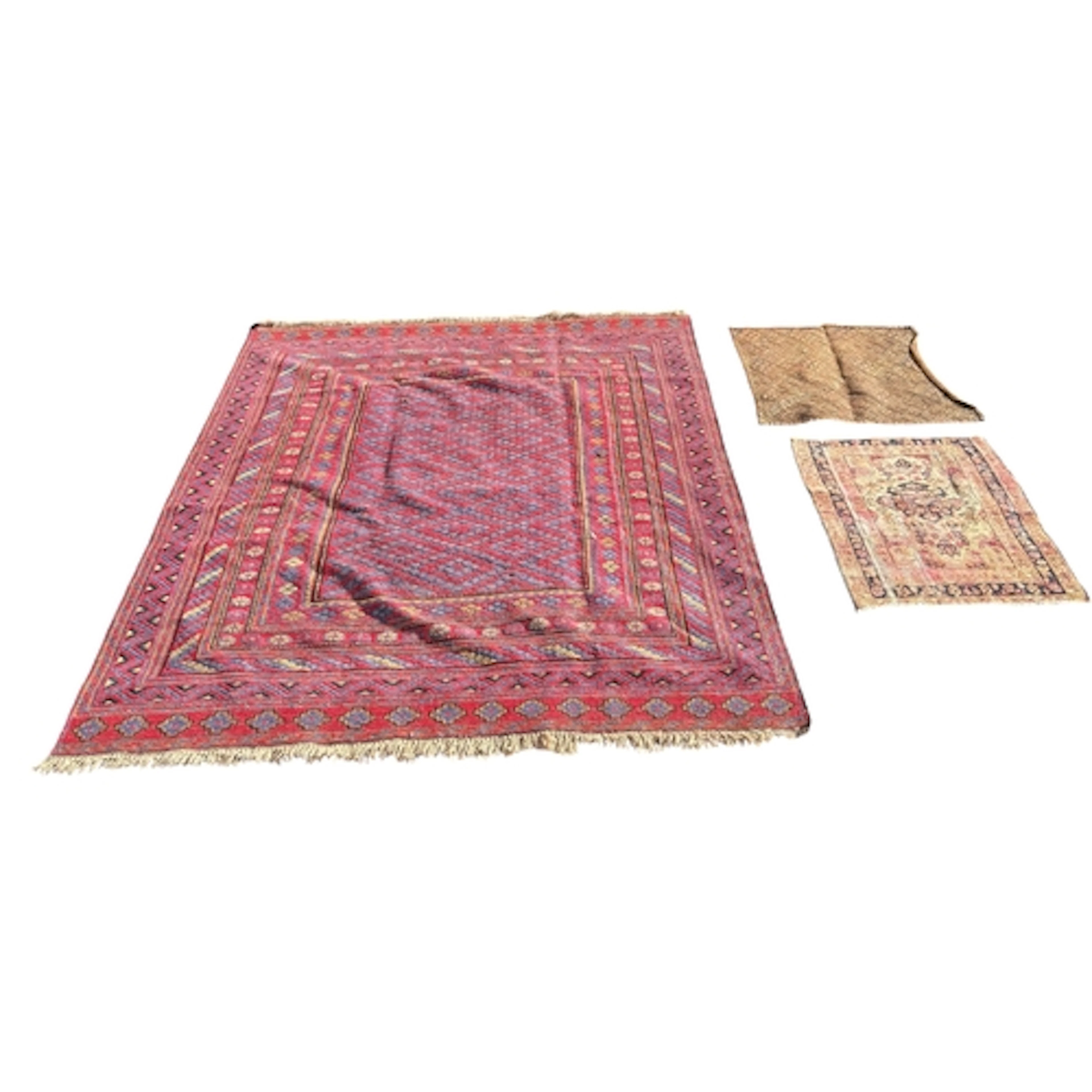TWO PERSIAN CARPETS TOGETHER WITH AN AFRICAN TEXTILE Largest...