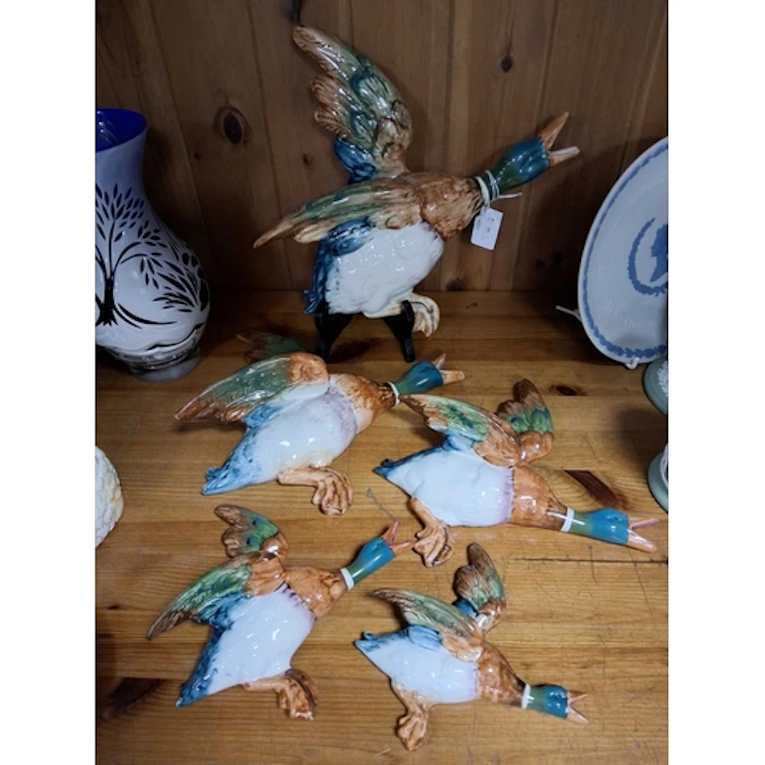 A SET OF FIVE VINTAGE GRADUATED BESWICK WALL DUCKS from mode...