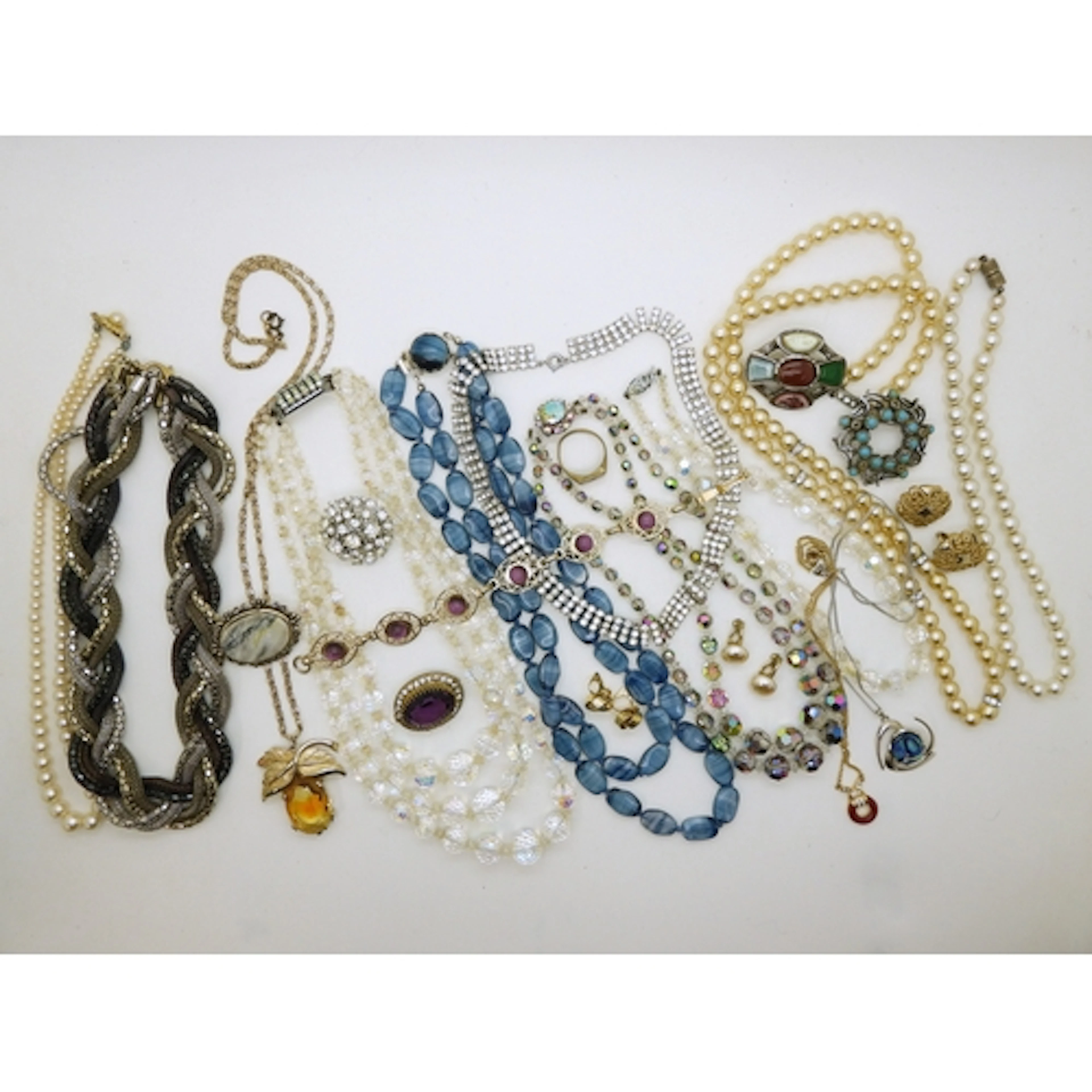 A collection of costume jewellery to include;- candy glass b...
