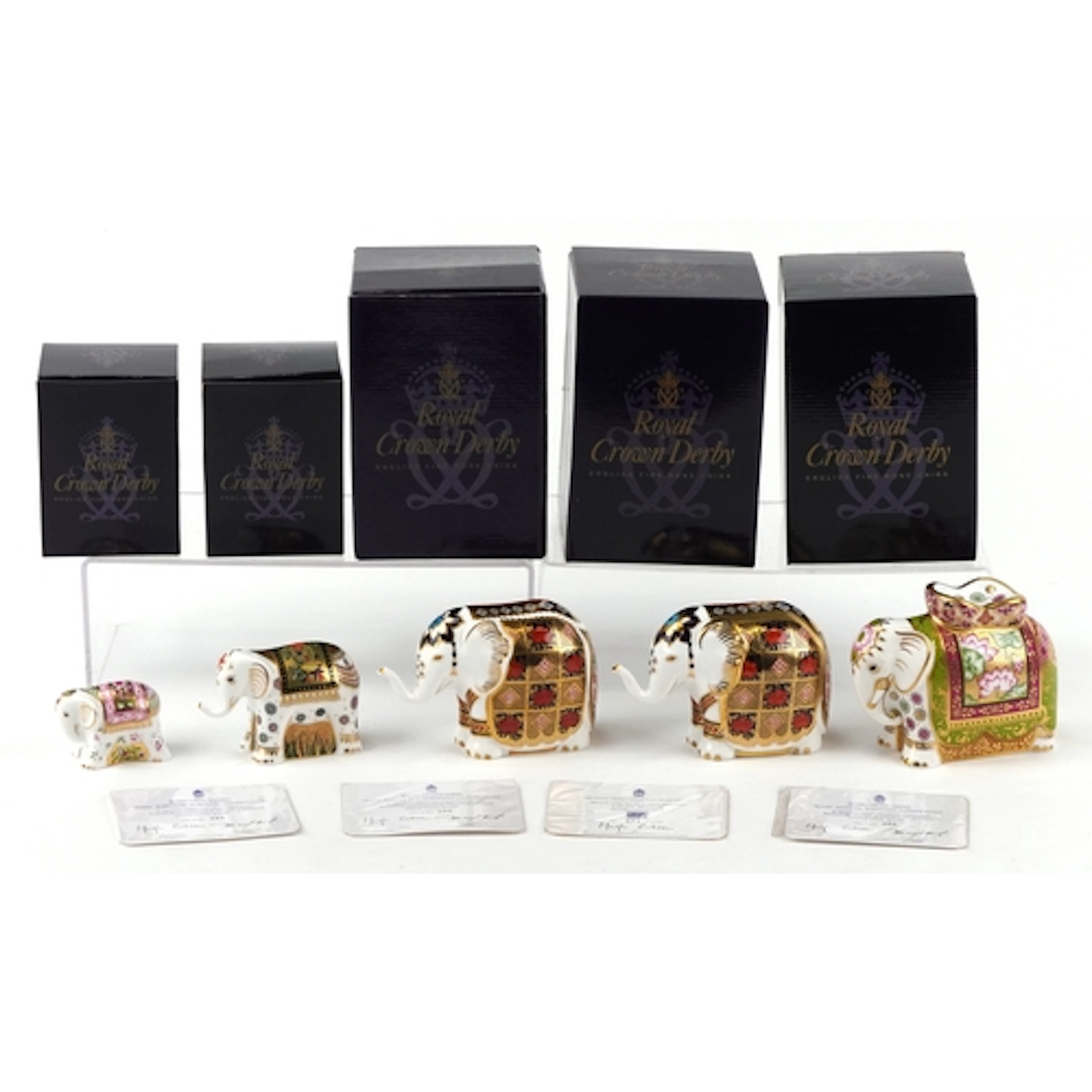Five Royal Crown Derby paperweights comprising Mother Indian...