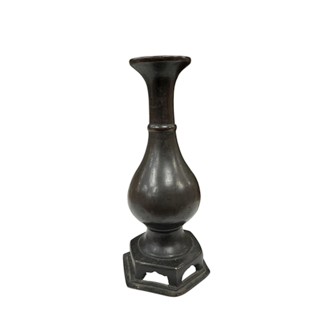 A Chinese bronze baluster shaped vase on hexagonal base, Min...
