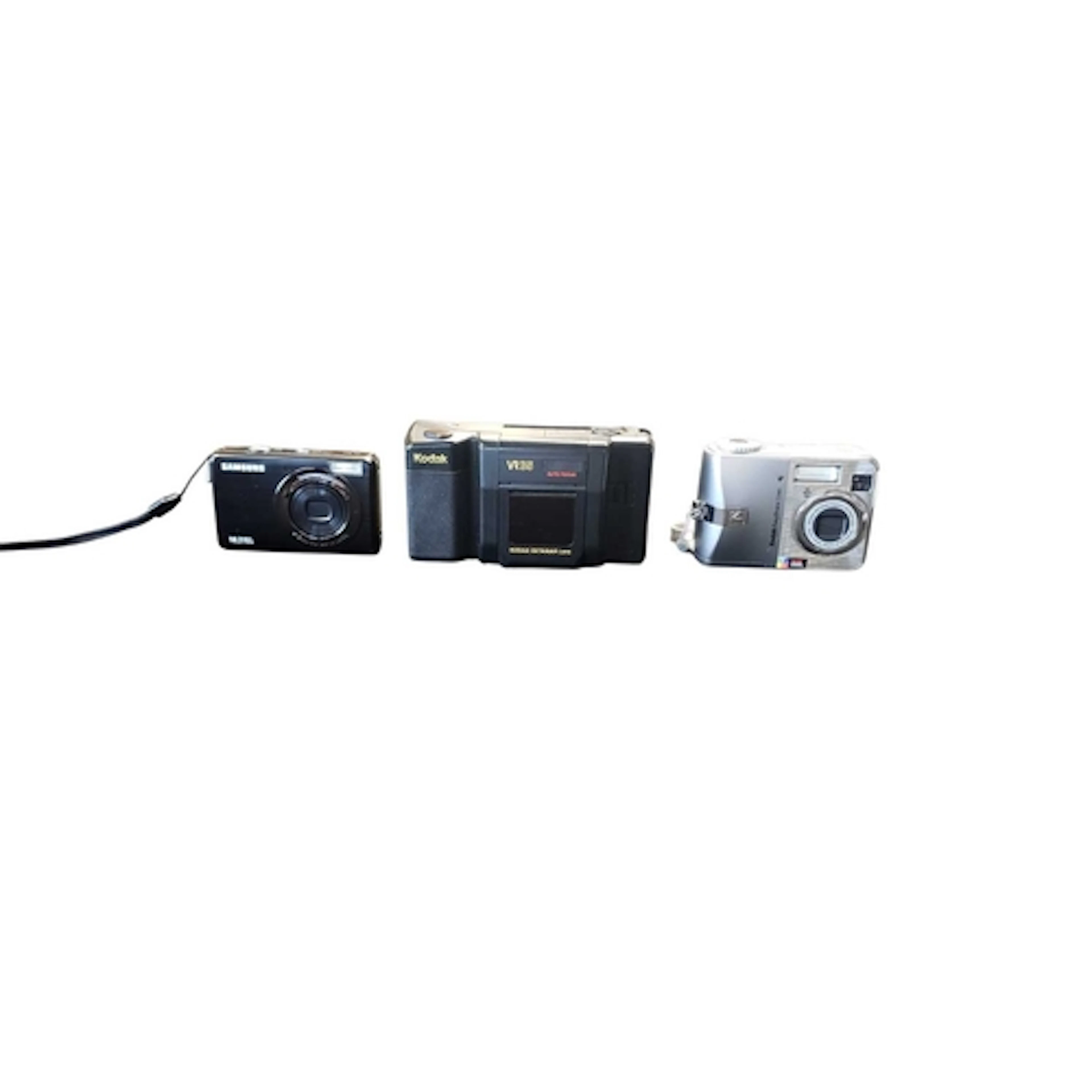 A collection of three vintage compact cameras. The collectio...