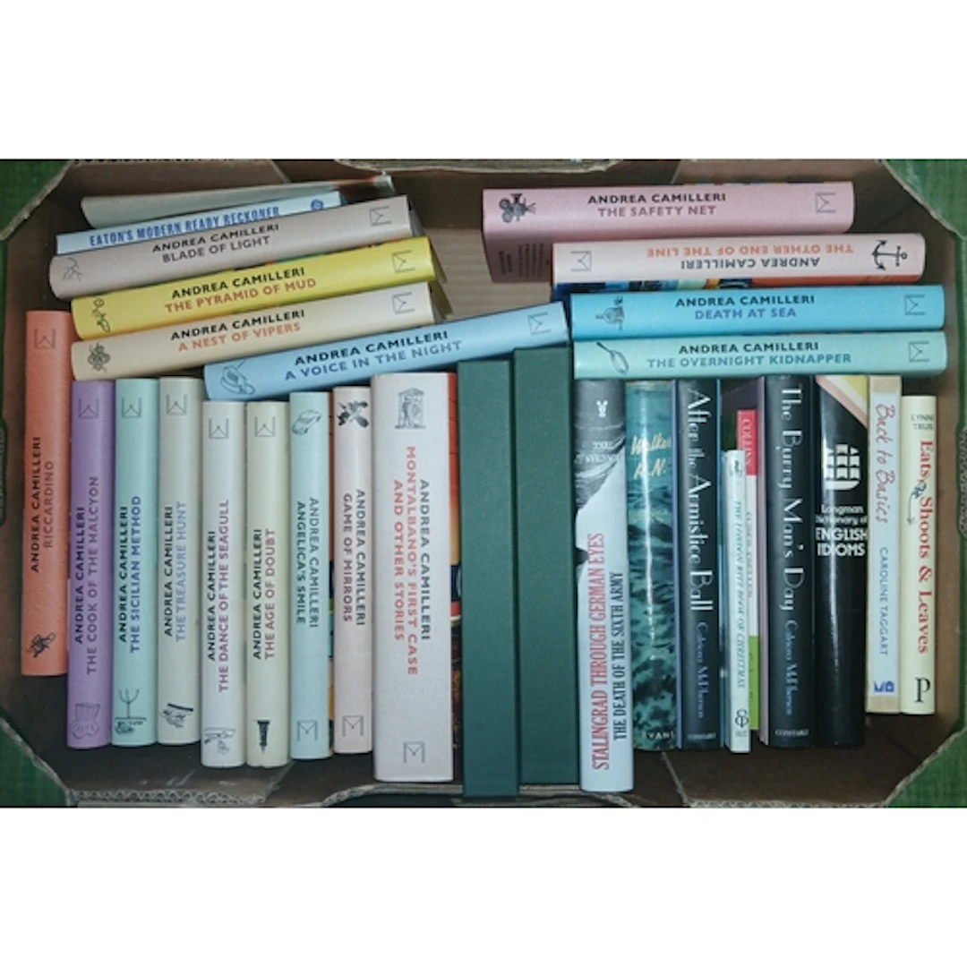 Nine boxes of assorted mainly hardback books, fiction and no...