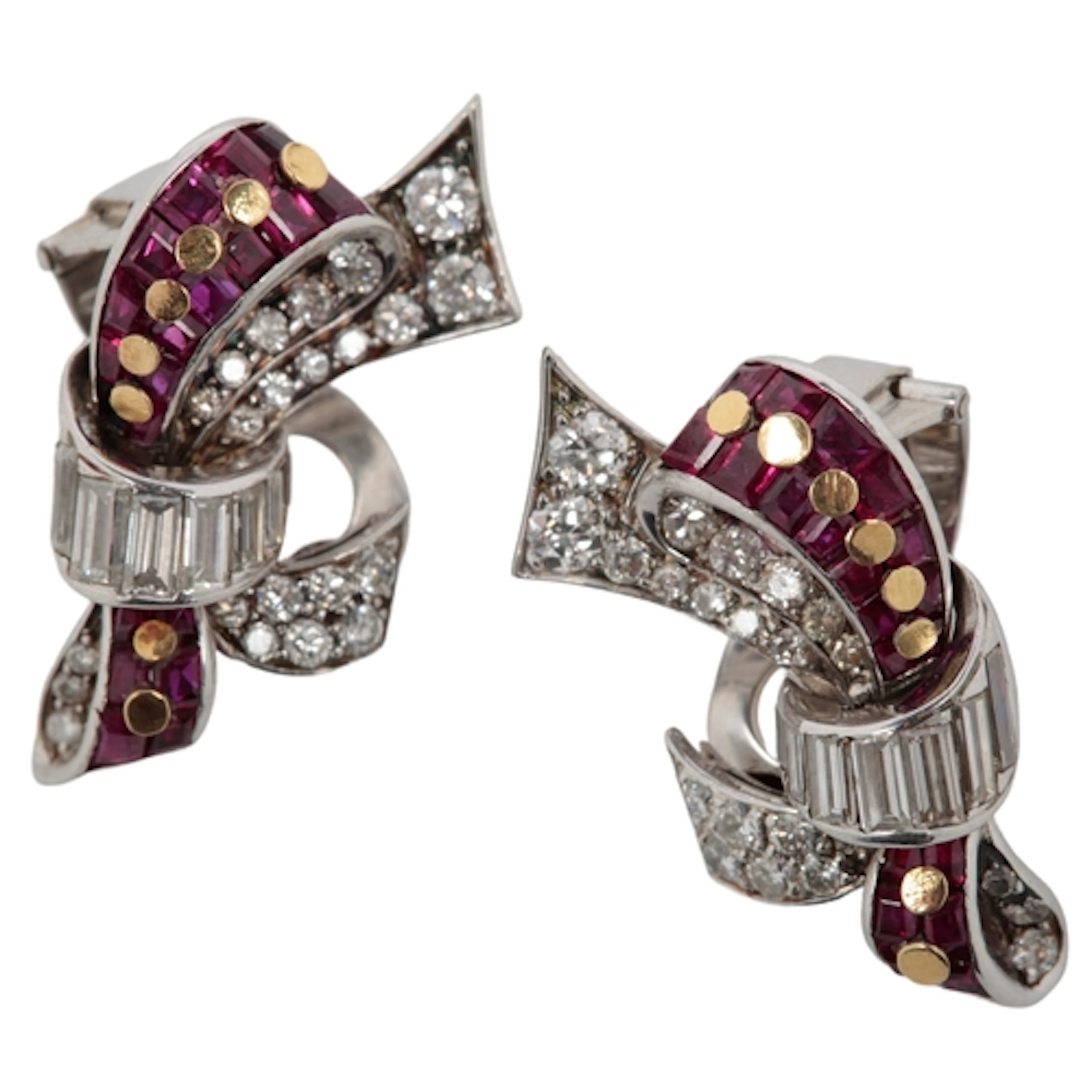 A pair of ruby and diamond ear clips, mid 20th century, each...