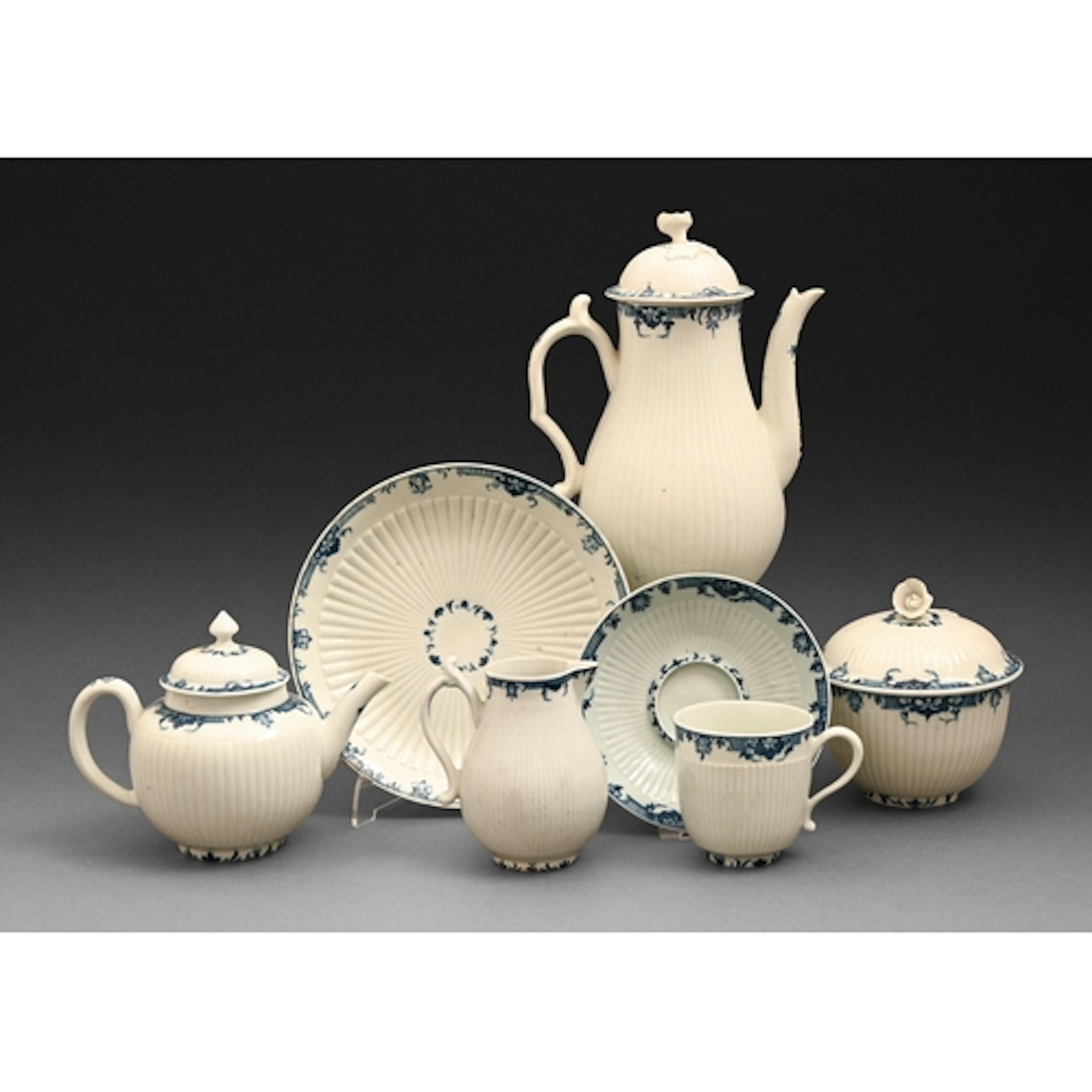 A Worcester blue and white fluted coffee pot and cover and o...