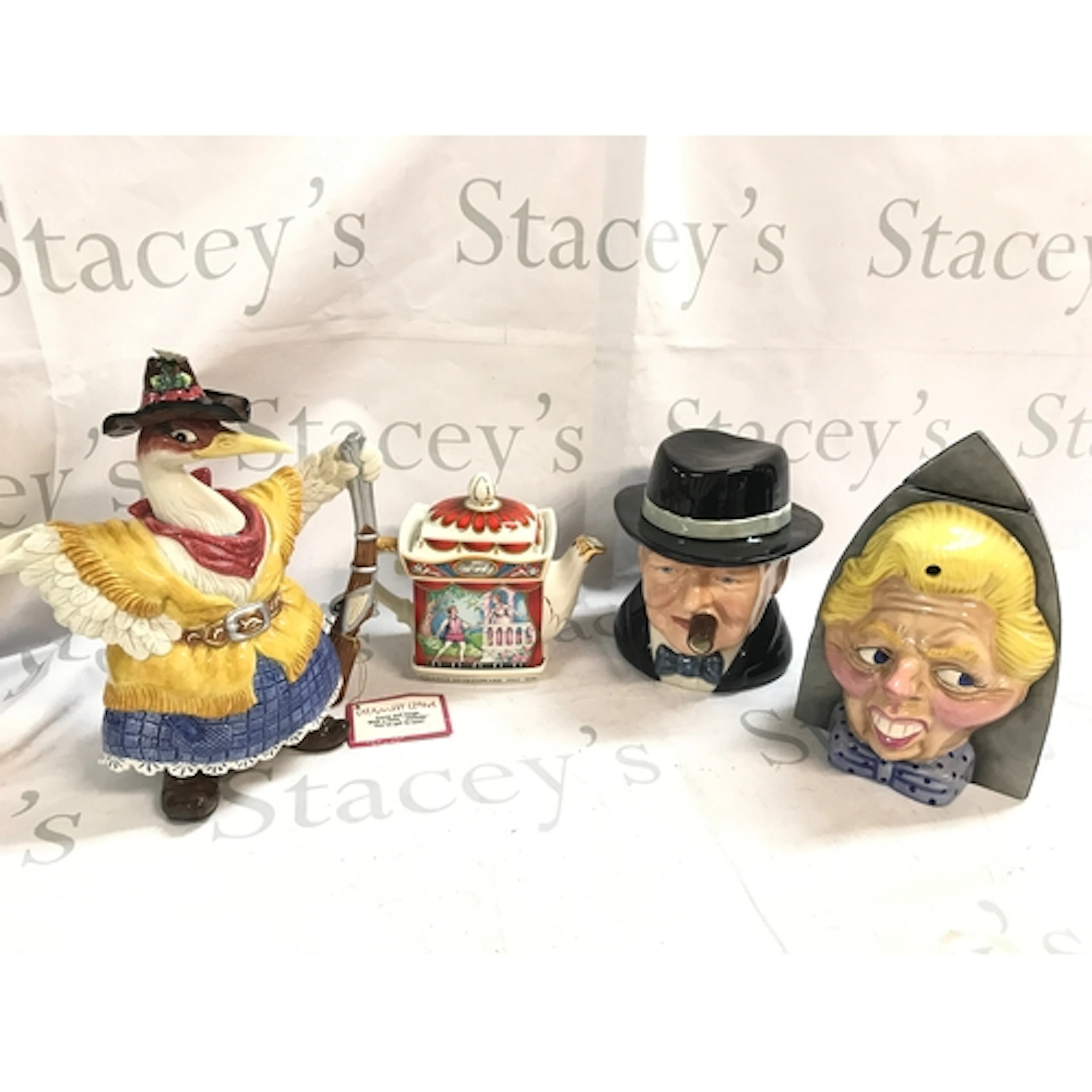 Four novelty ceramic tea pots including Calamity Crane Fitz ...