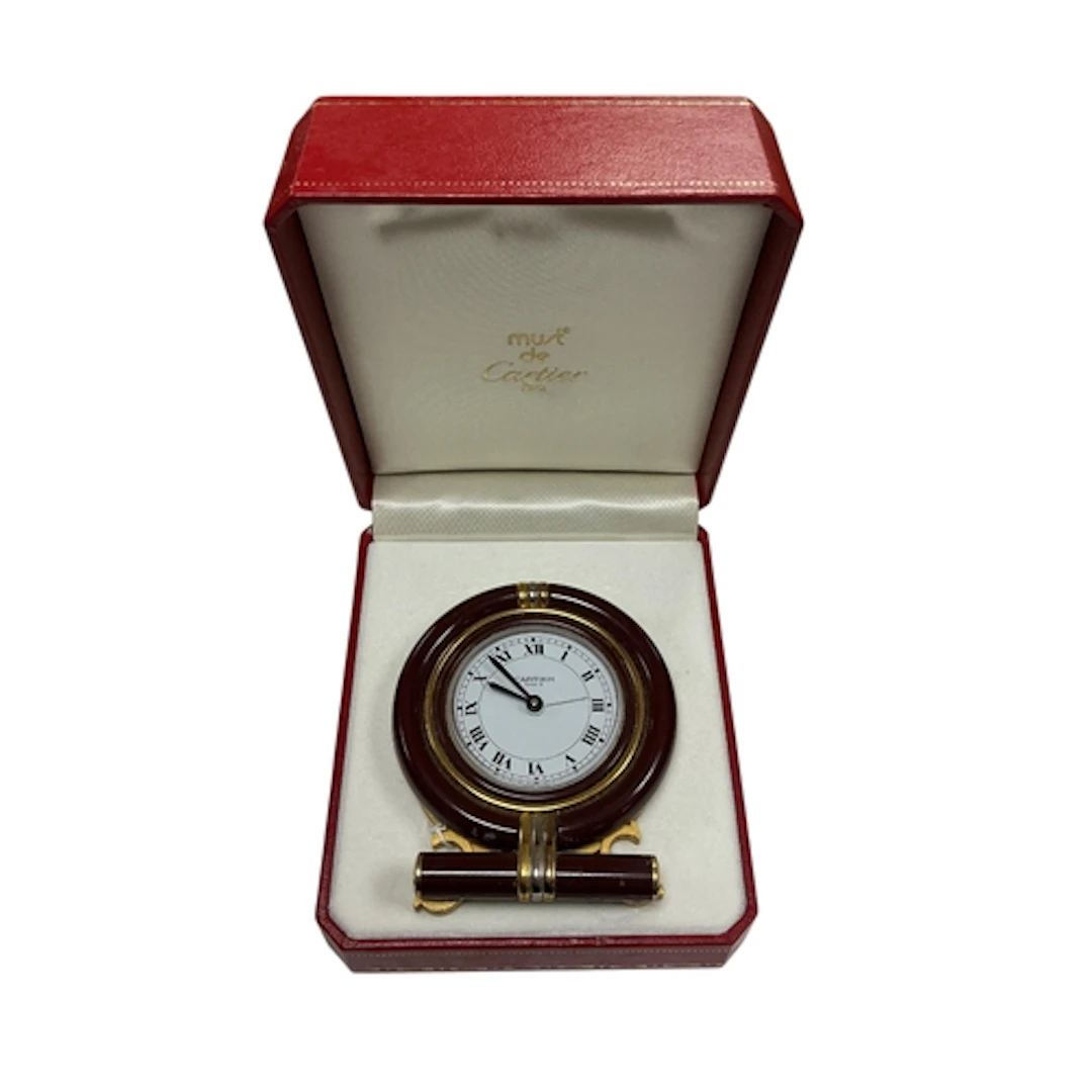 A Cartier oval desk clock, ref. 7522, no. 06266, with box, 8...