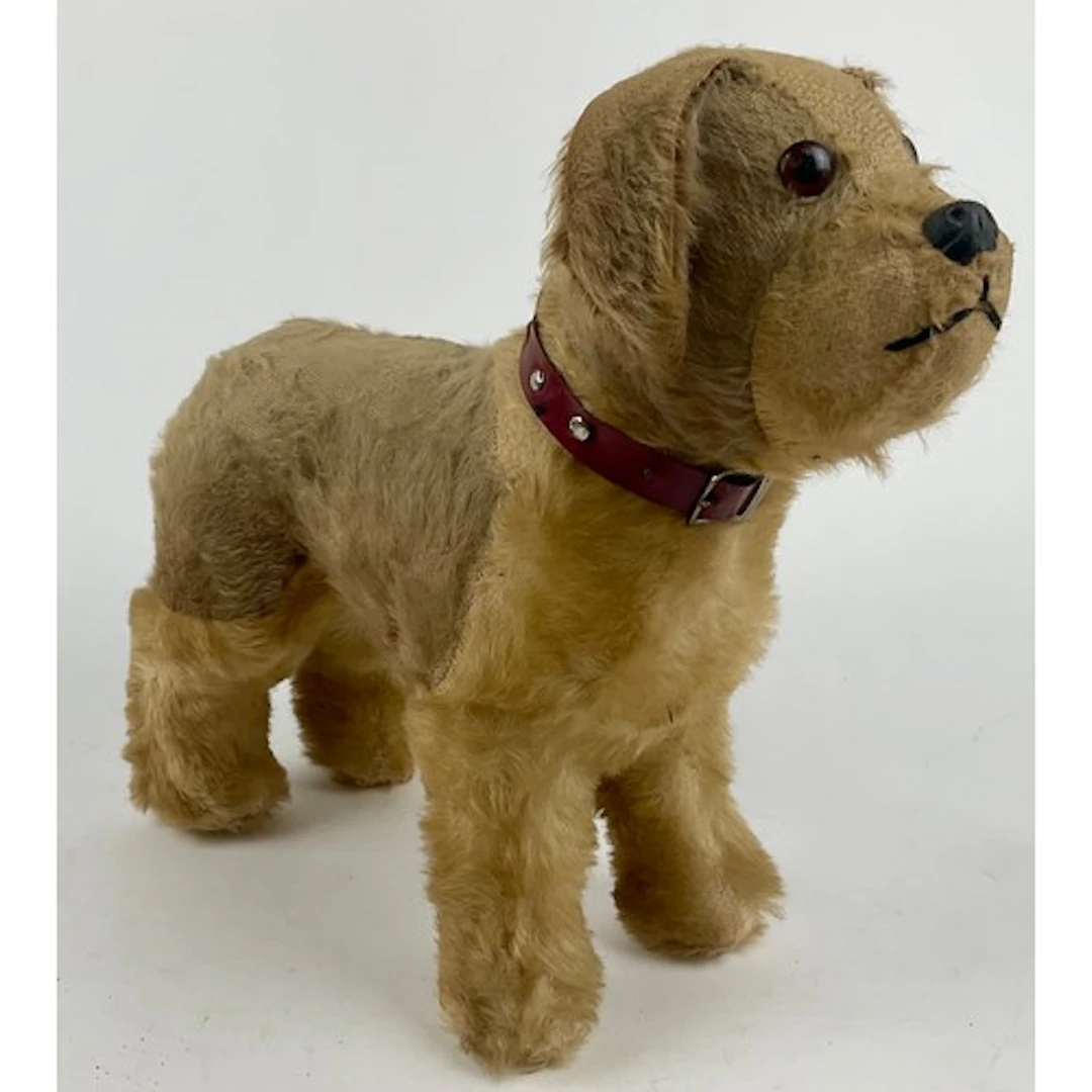 A large 1950’s freestanding mohair Terrier, dark amber eyes,...