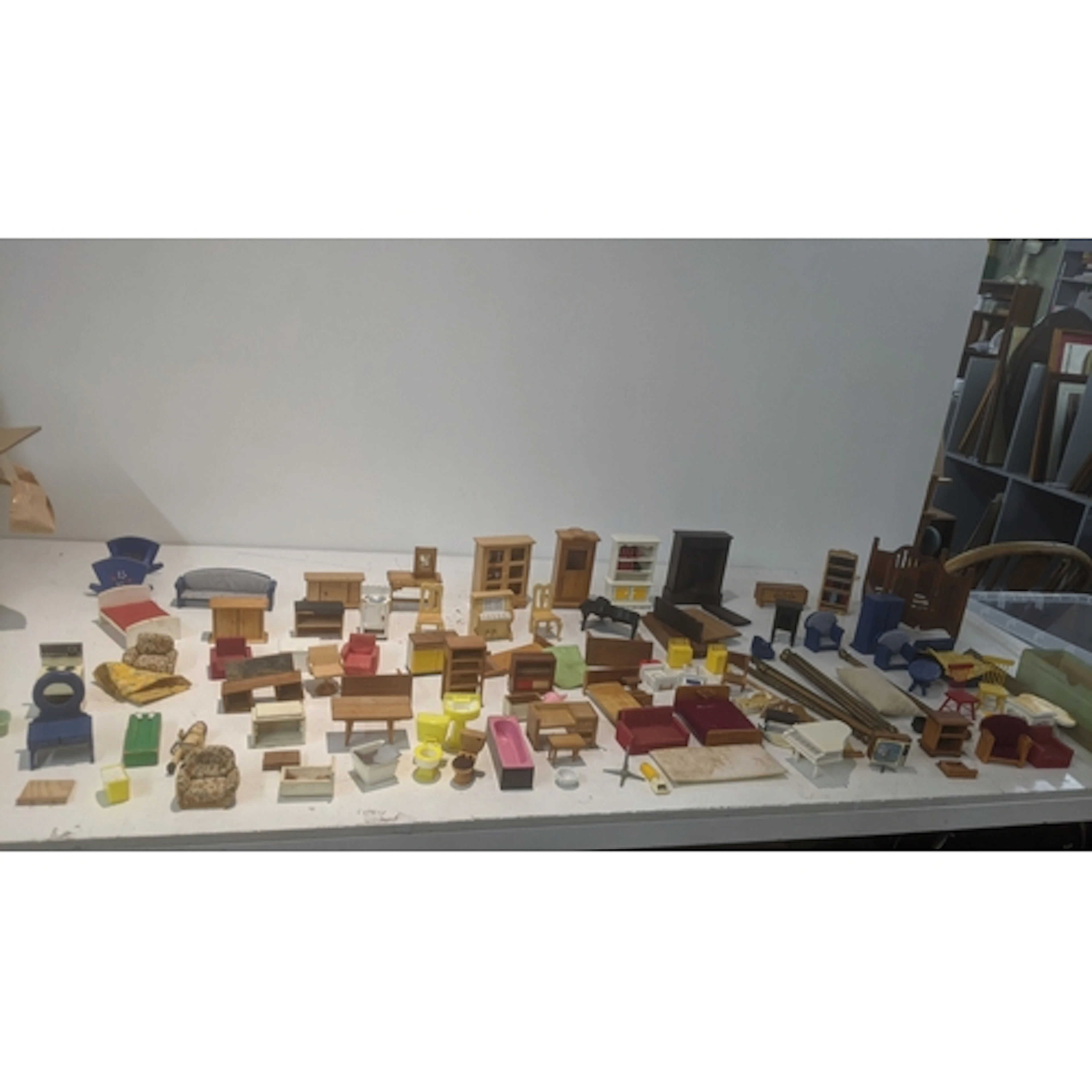 A collection of mid 20th century dolls house furniture to in...