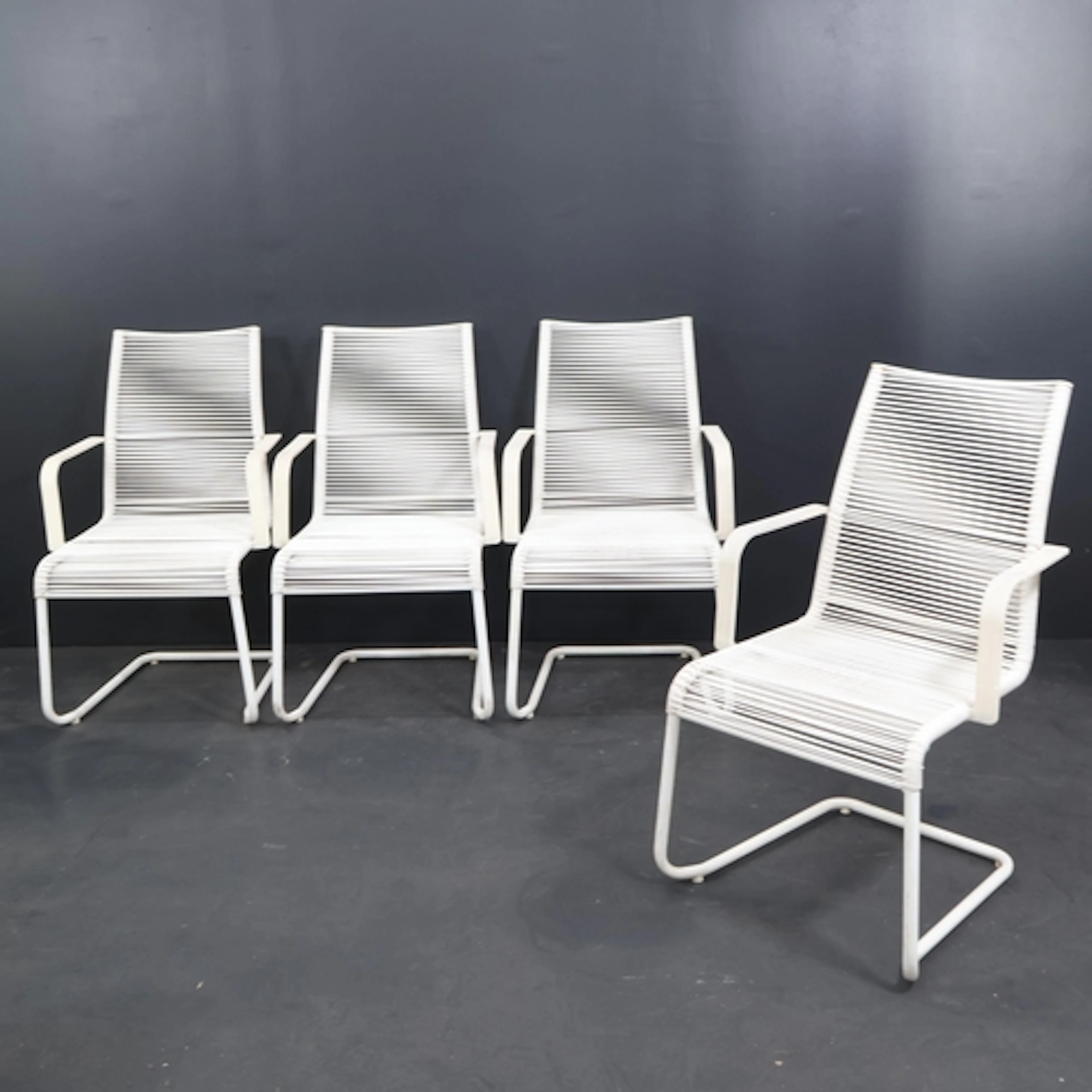 A set of four Vintage Vasman garden chairs by Niels Gammelga...