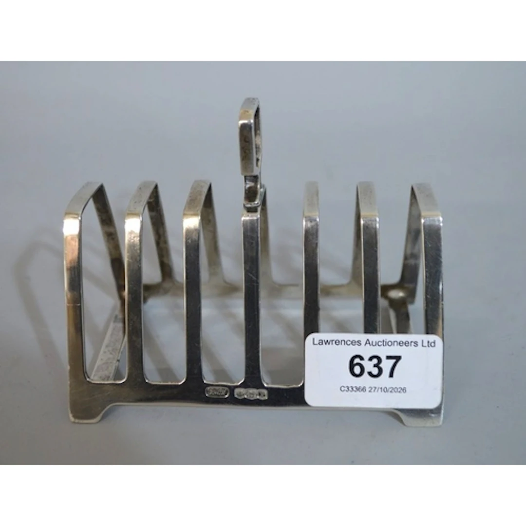 Sheffield silver six division toast rack, of Art Deco design...