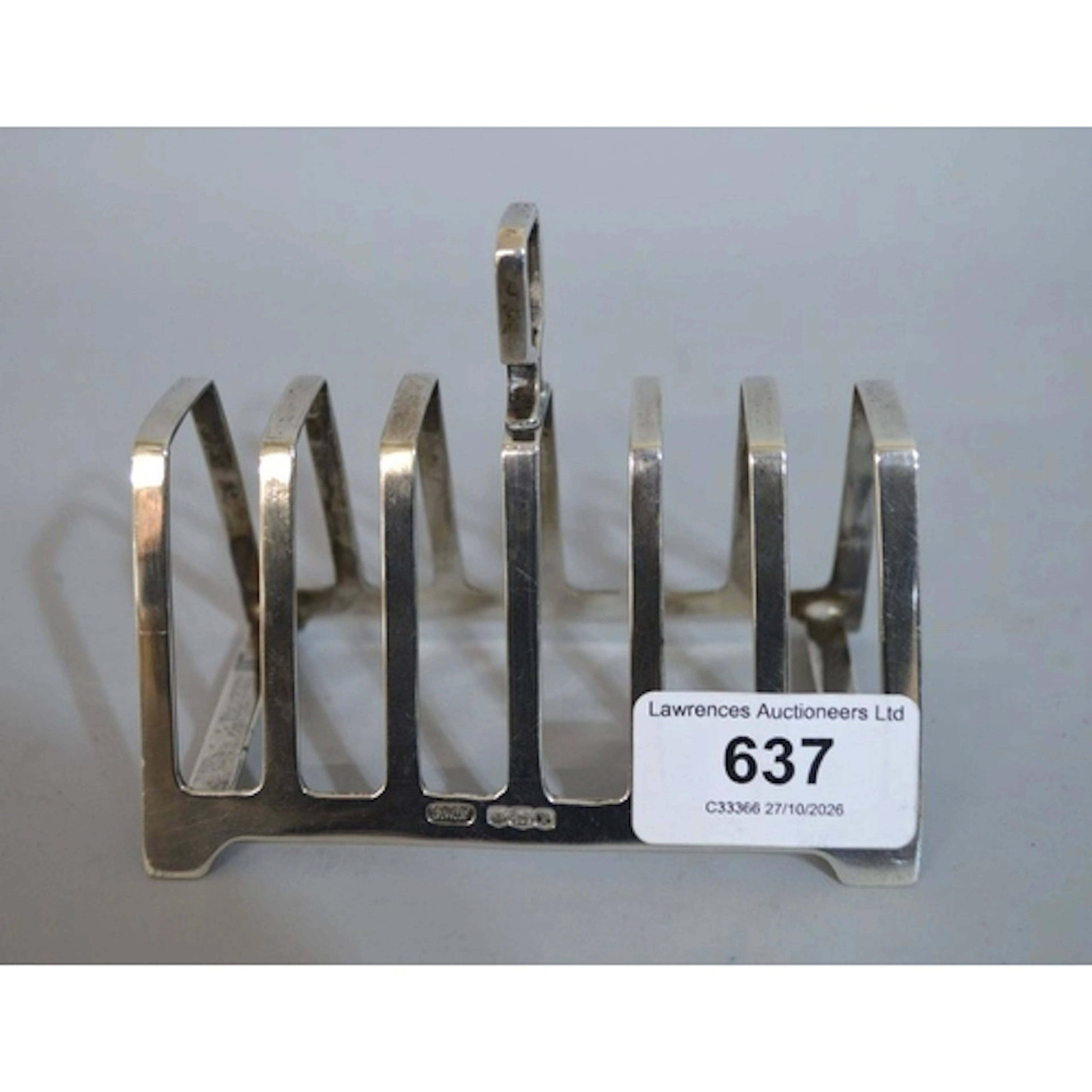 Sheffield silver six division toast rack, of Art Deco design...