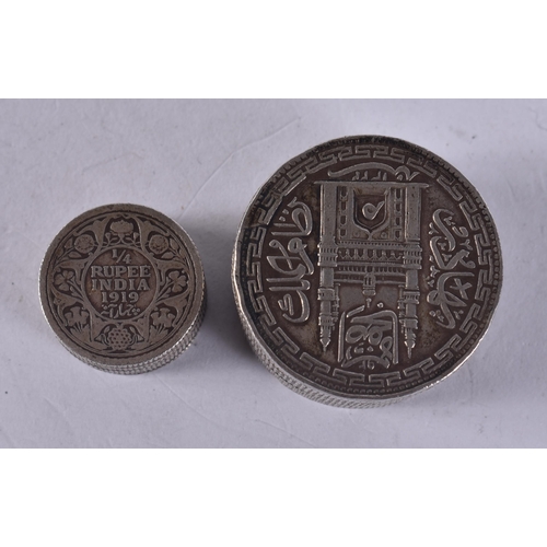 AN ISLAMIC COIN BOX together with another. 56.3 grams. Large...