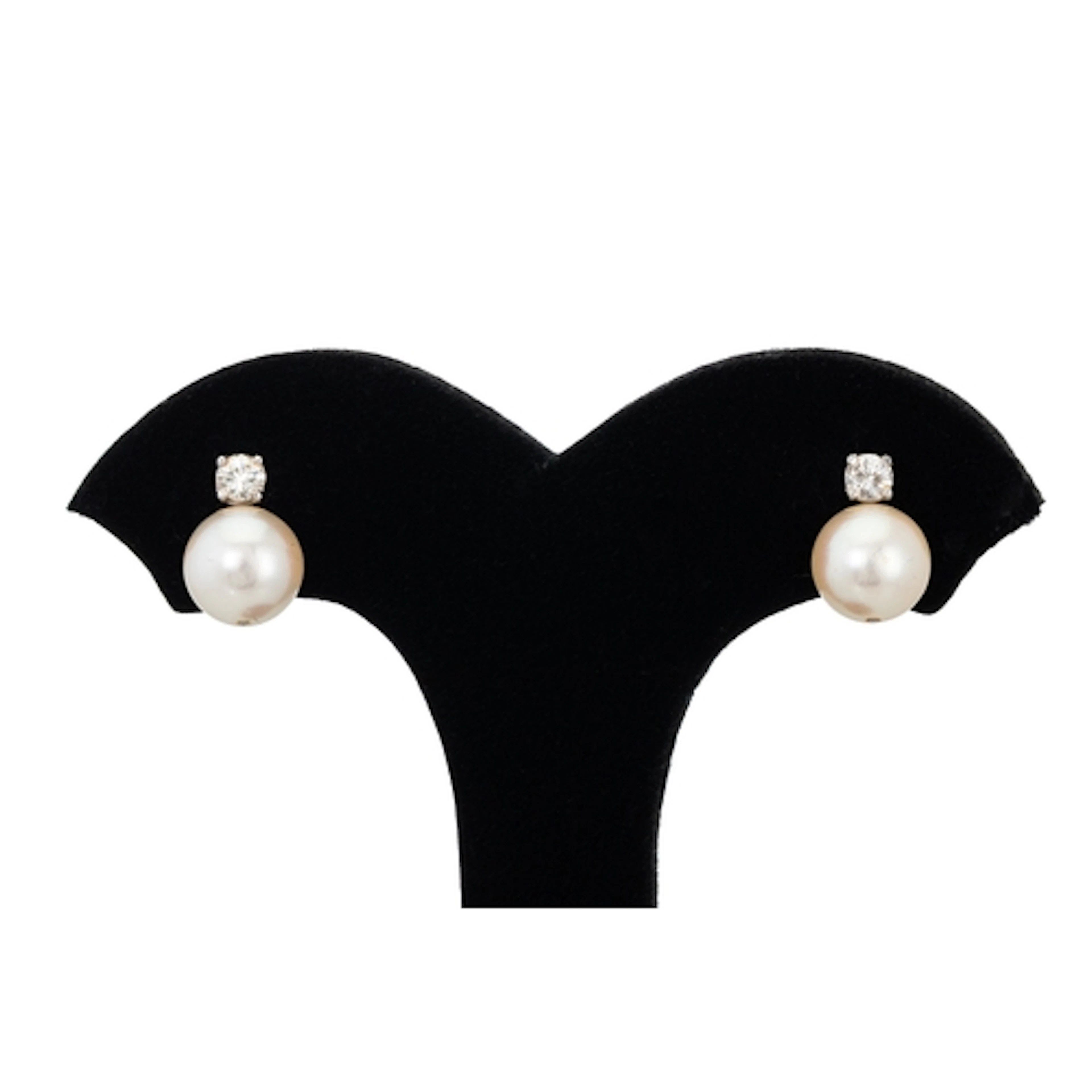 A PAIR OF PEARL AND DIAMOND EARRINGS, mounted in 18ct gold. ...