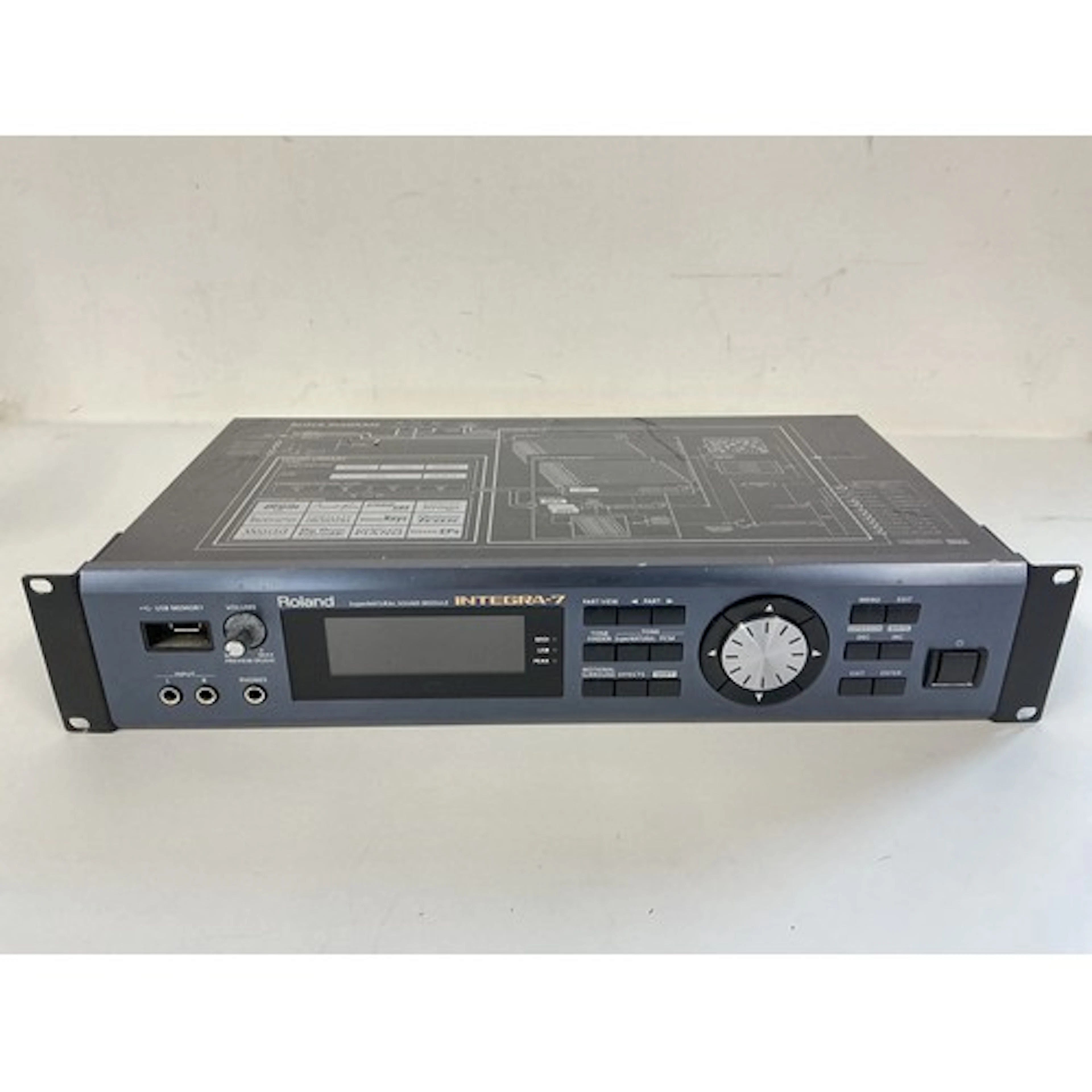 A Roland Integra 7 synthesizer sound module.