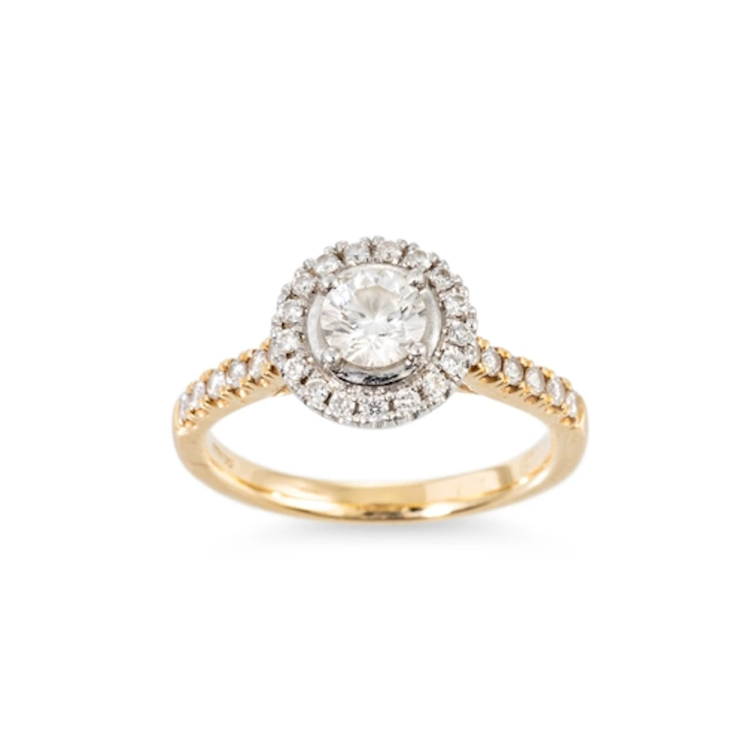 A DIAMOND HALO STYLE CLUSTER RING, the central round brillia...