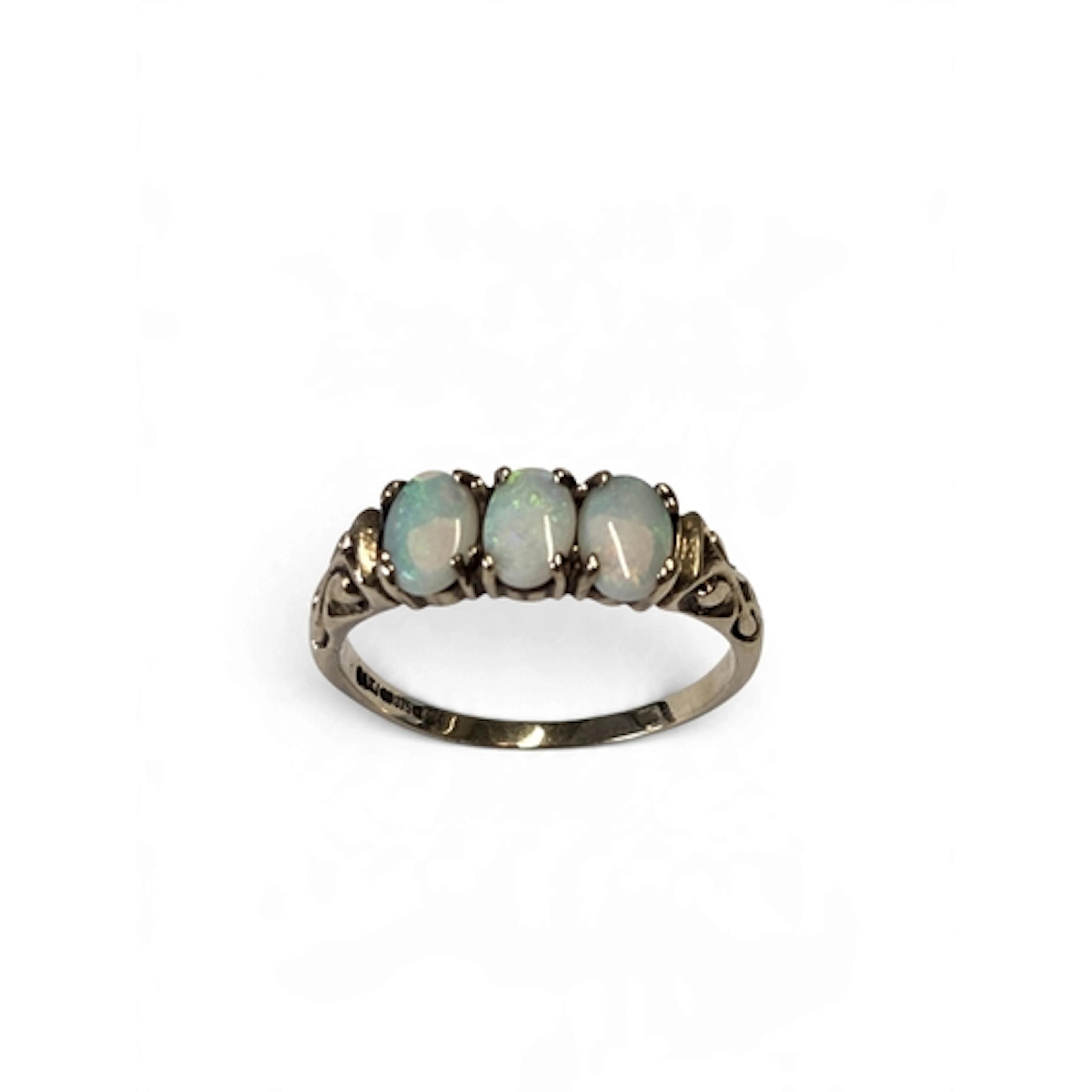 A good 9-carat gold three-stone opal trilogy ring, set with ...