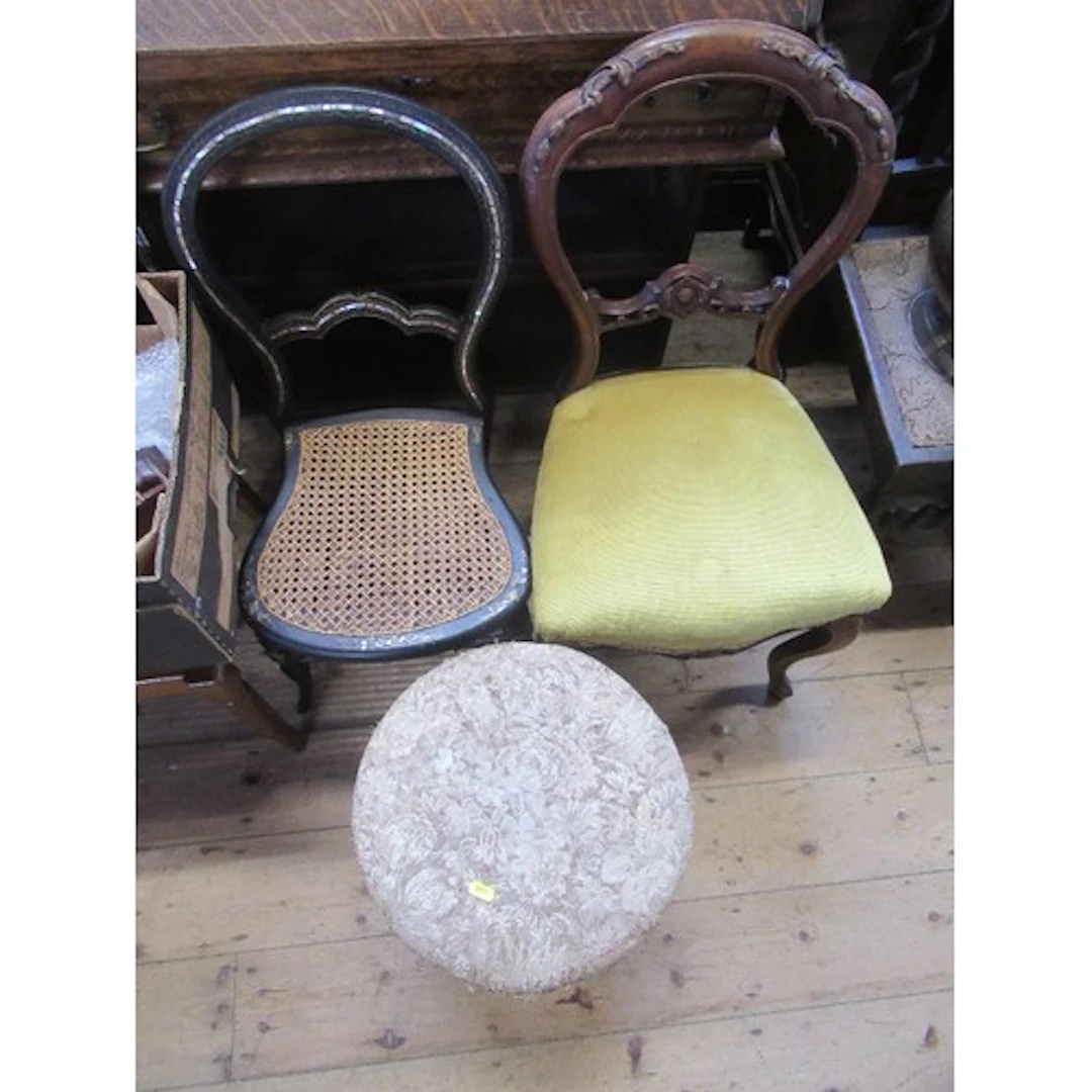 A Victorian circular stool and two chairs, one decorated wit...