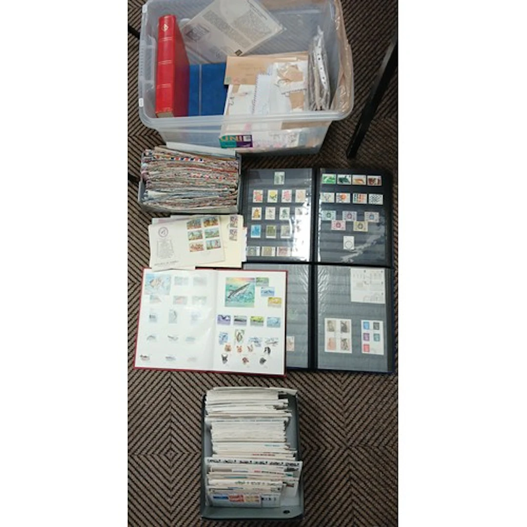 Collection of First Day Covers, and six stamp albums moderat...