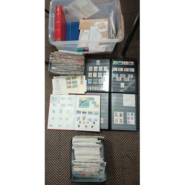 Collection of First Day Covers, and six stamp albums moderat...