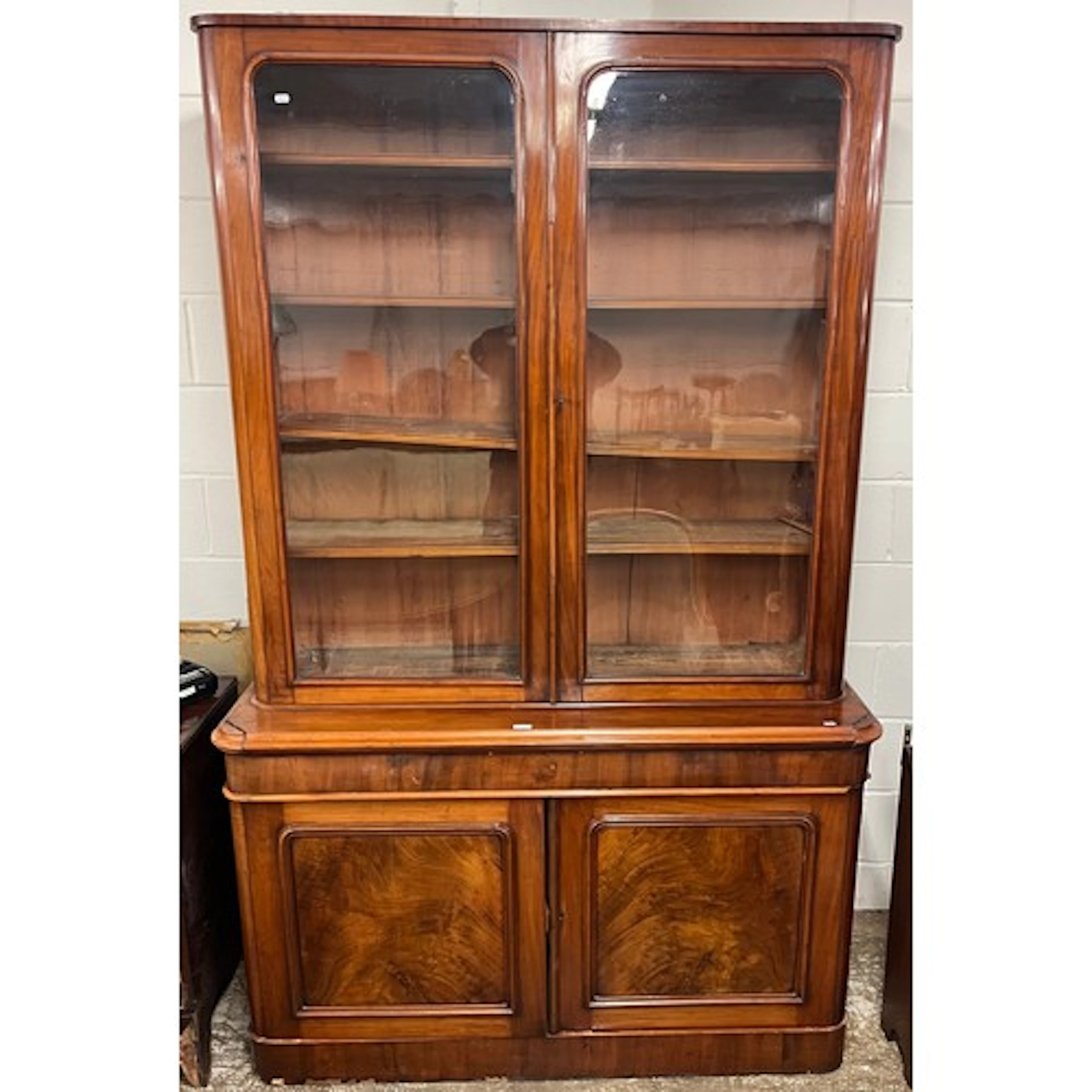 Victorian mahogany cabinet bookcase, glazed doors over friez...