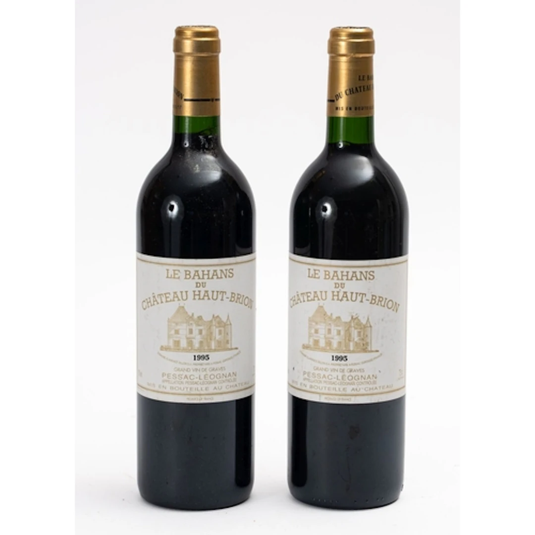 Two bottles of Le Bahans Chateau Haut-Brion 1995. Fill level...