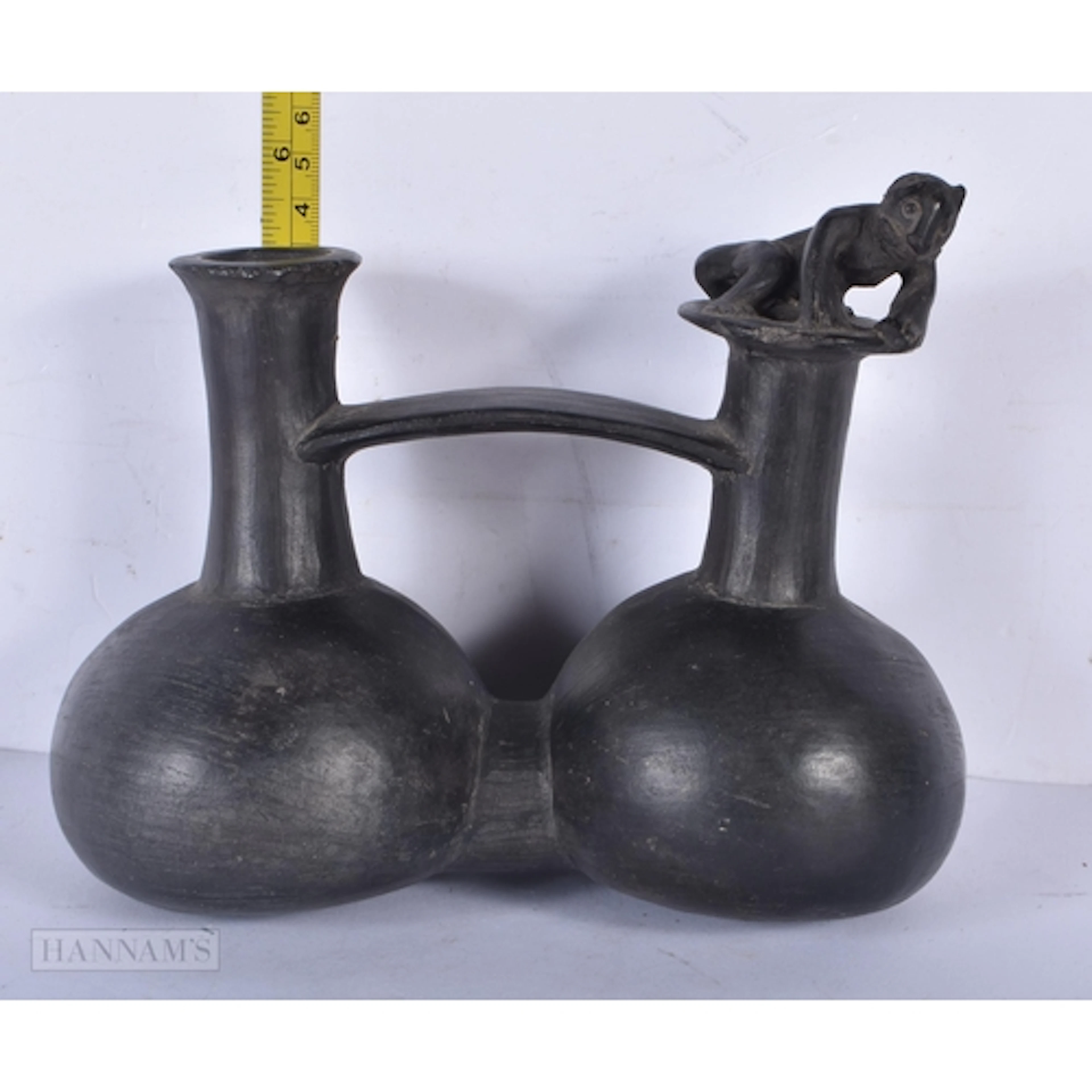 A South American Double chambered pottery Whistling bottle ...