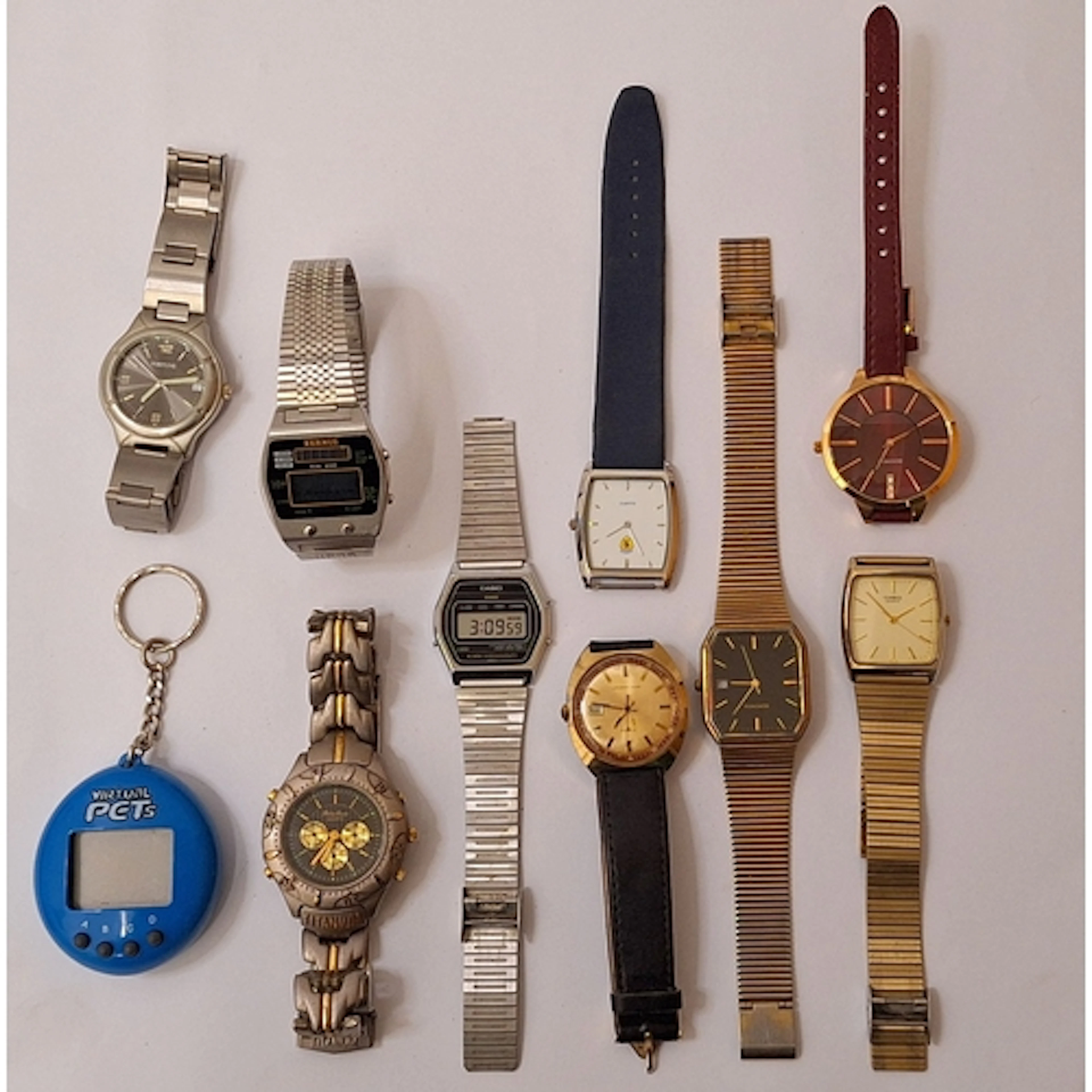 Wristwatches incl. Sekonda metallic ruby dial, baton markers...