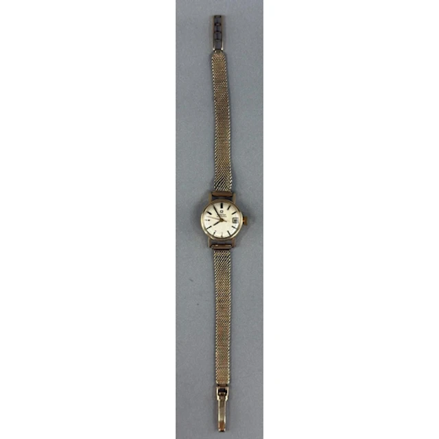 Watches: Ladies 9ct gold Omega automatic, 17mm round silver-...