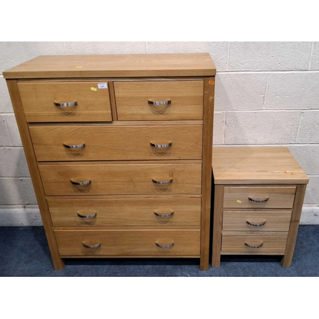 A MODERN LIGHT OAK CHEST OF TWO SHORT OVER FOUR LONG DRAWERS...