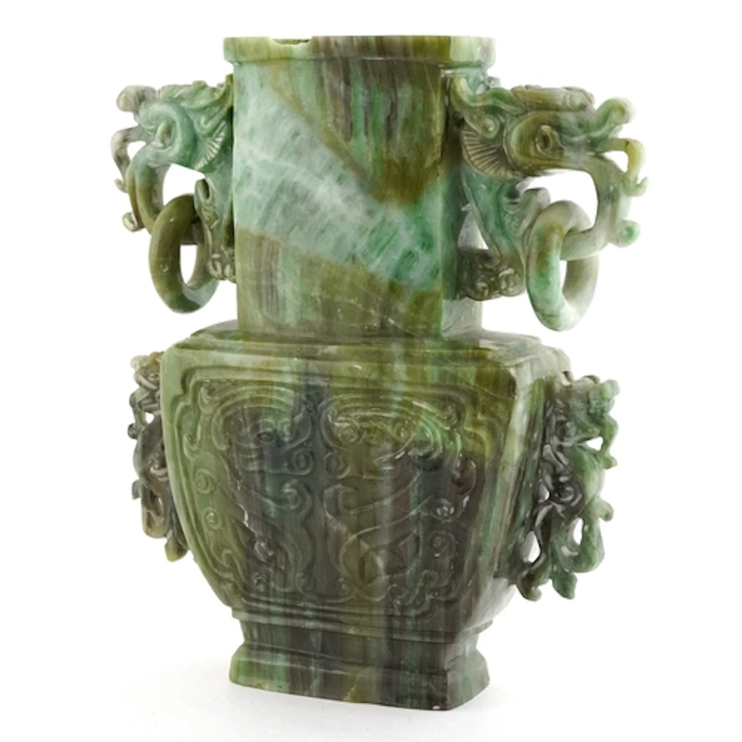 Chinese marbleised green stone vase having dragon head and r...