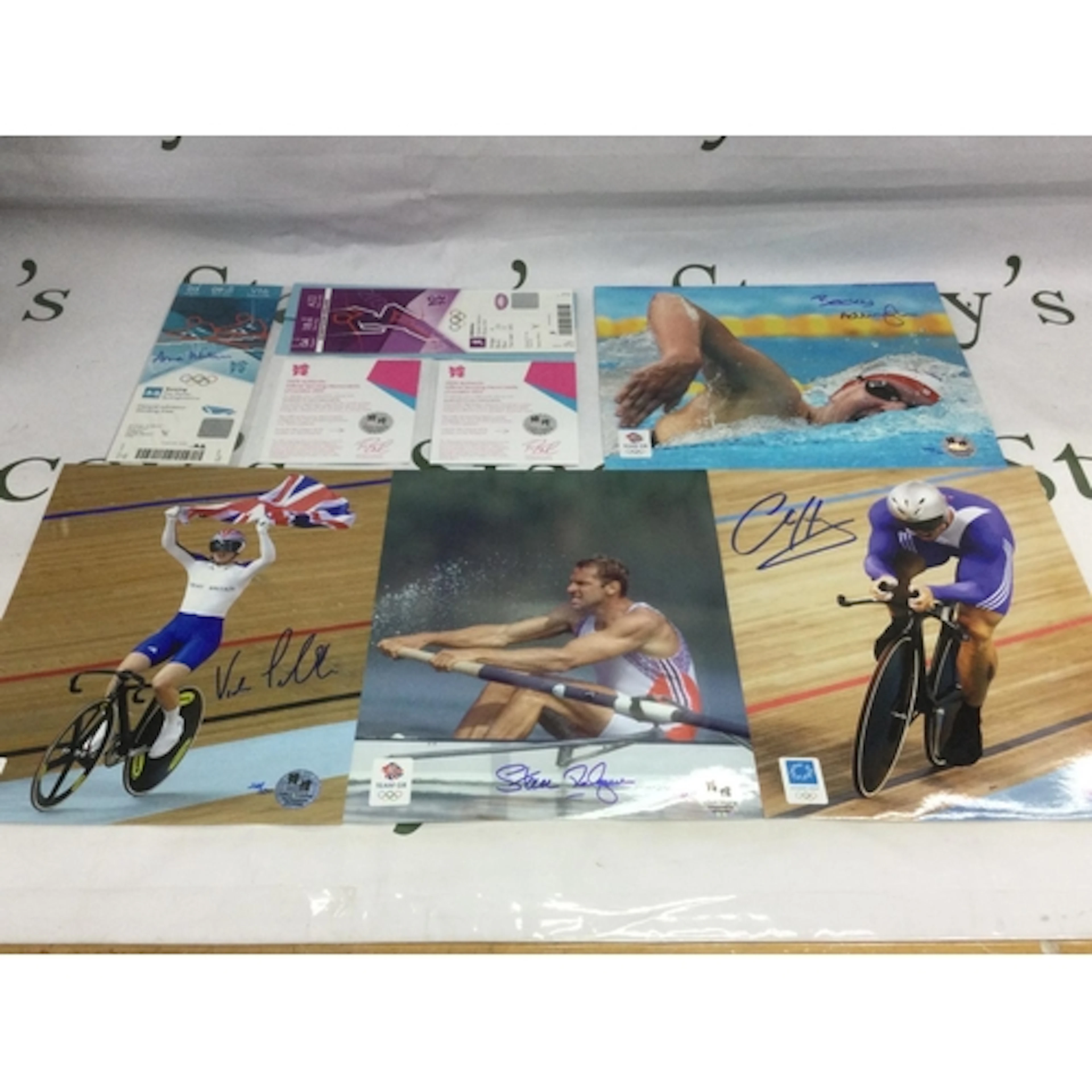 A small collection of signed GB Olympic memorabilia comprisi...