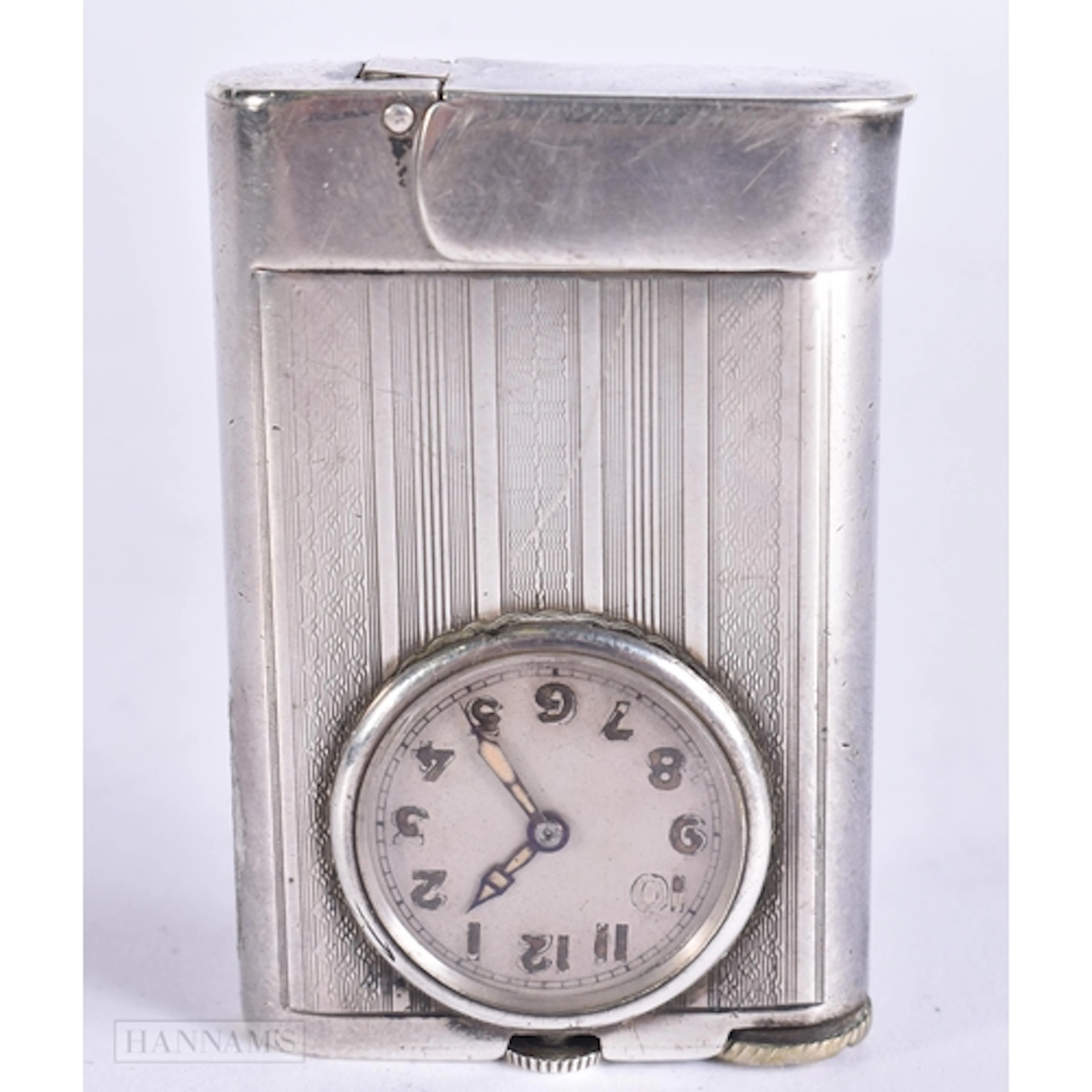 AN ART DECO FRENCH SILVER CLOCK LIGHTER. 5.75 cm high.