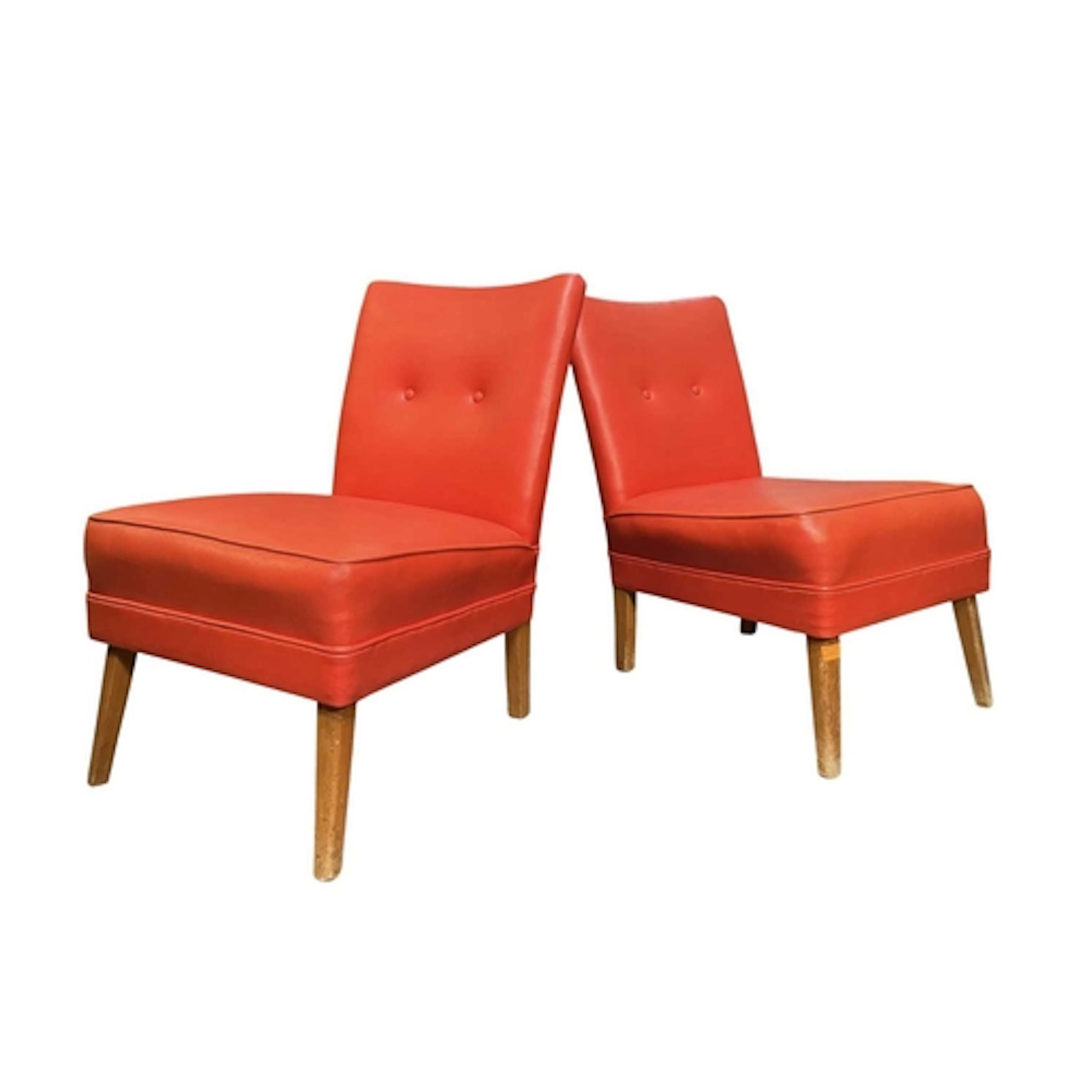 A pair of retro mid 20th century low, easy lounge chairs. Ea...