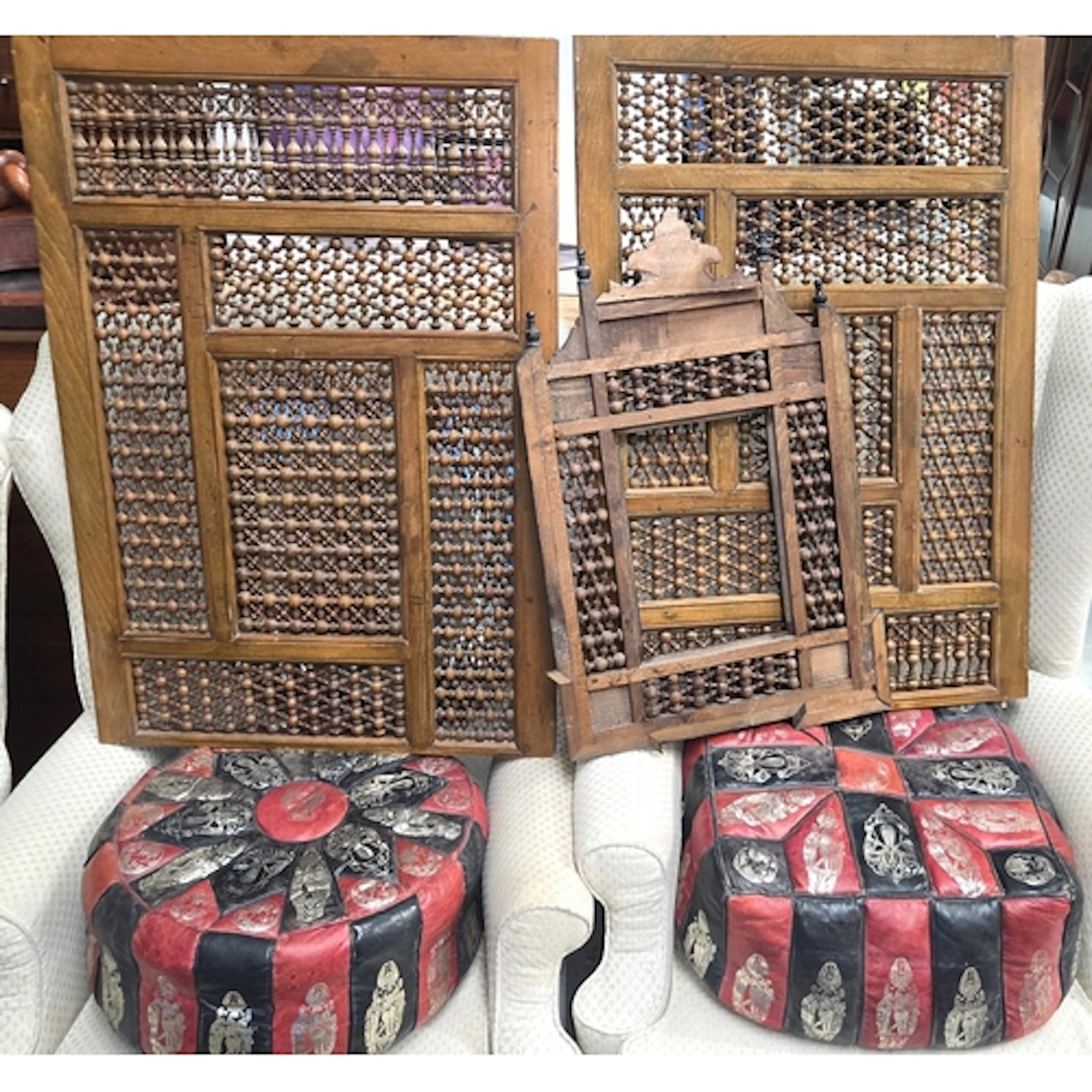 Two Middle Eastern cushions; carved wood screen etc.