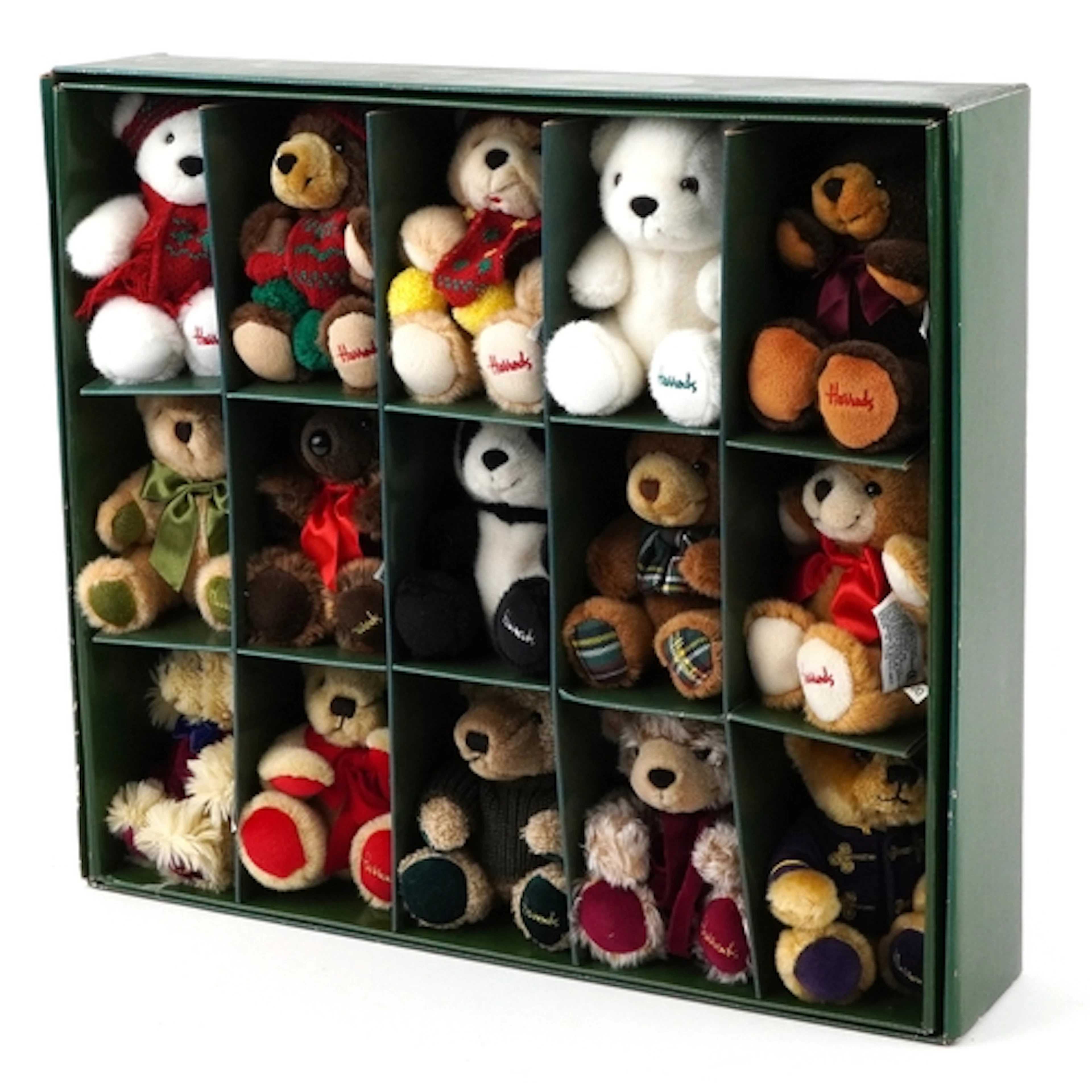 Fifteen Harrod's Christmas teddy bears years 1986-2000, hous...