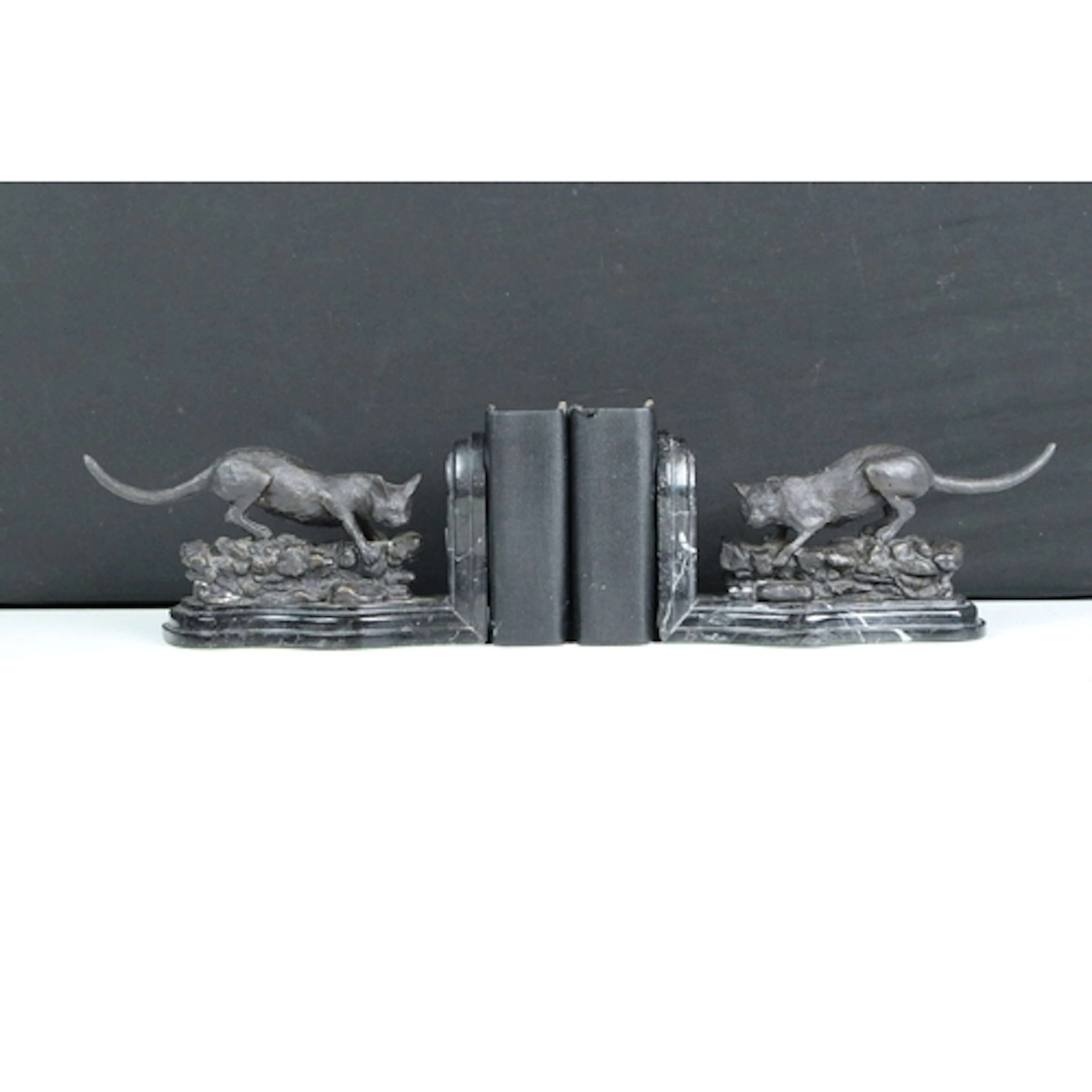 20th century bronze bookends in the form of cats mounted on ...