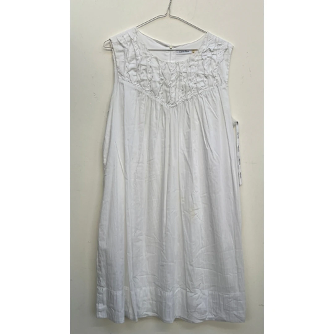 A Calvin Klein white cotton dress, size 14