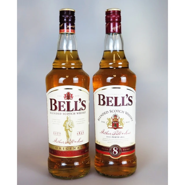 Two 1 Litre bottles of Bells blended scotch whiskey. ALCOHO...