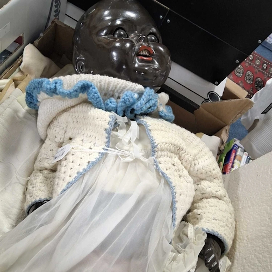 A LARGE DOLL with a composite body and limbs, retractable ey...
