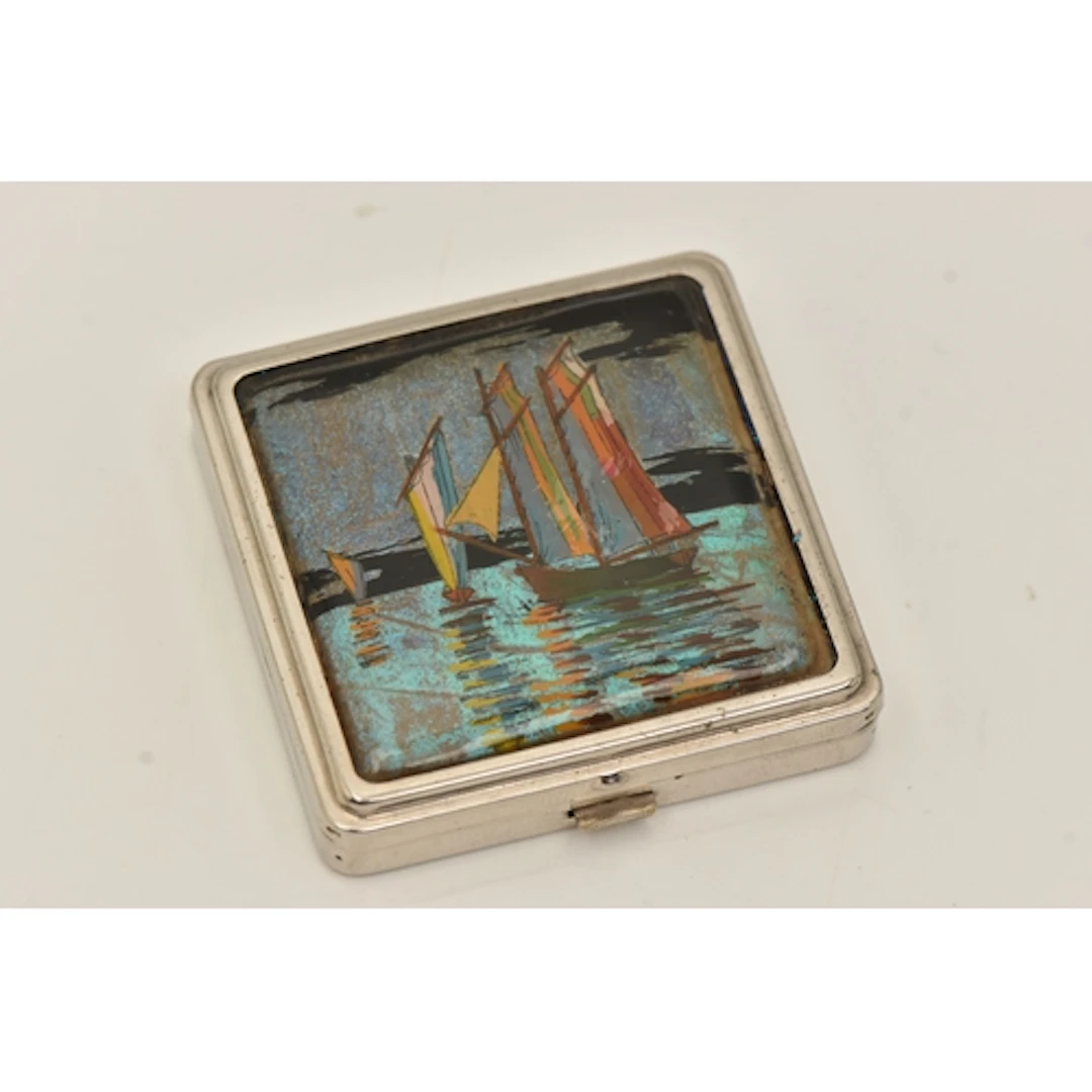 A BUTTERFLY WING COMPACT, white metal compact, with butterlf...