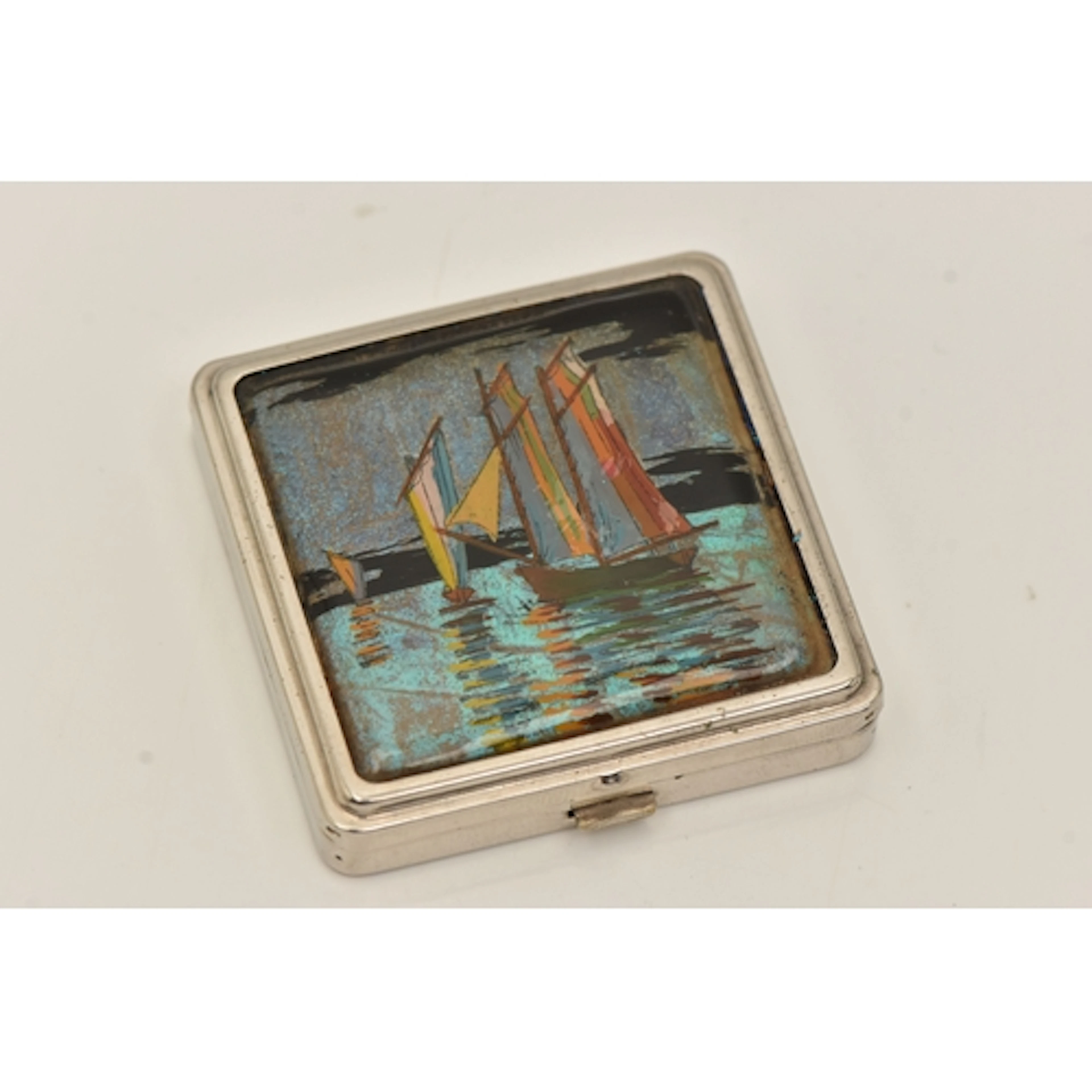 A BUTTERFLY WING COMPACT, white metal compact, with butterlf...