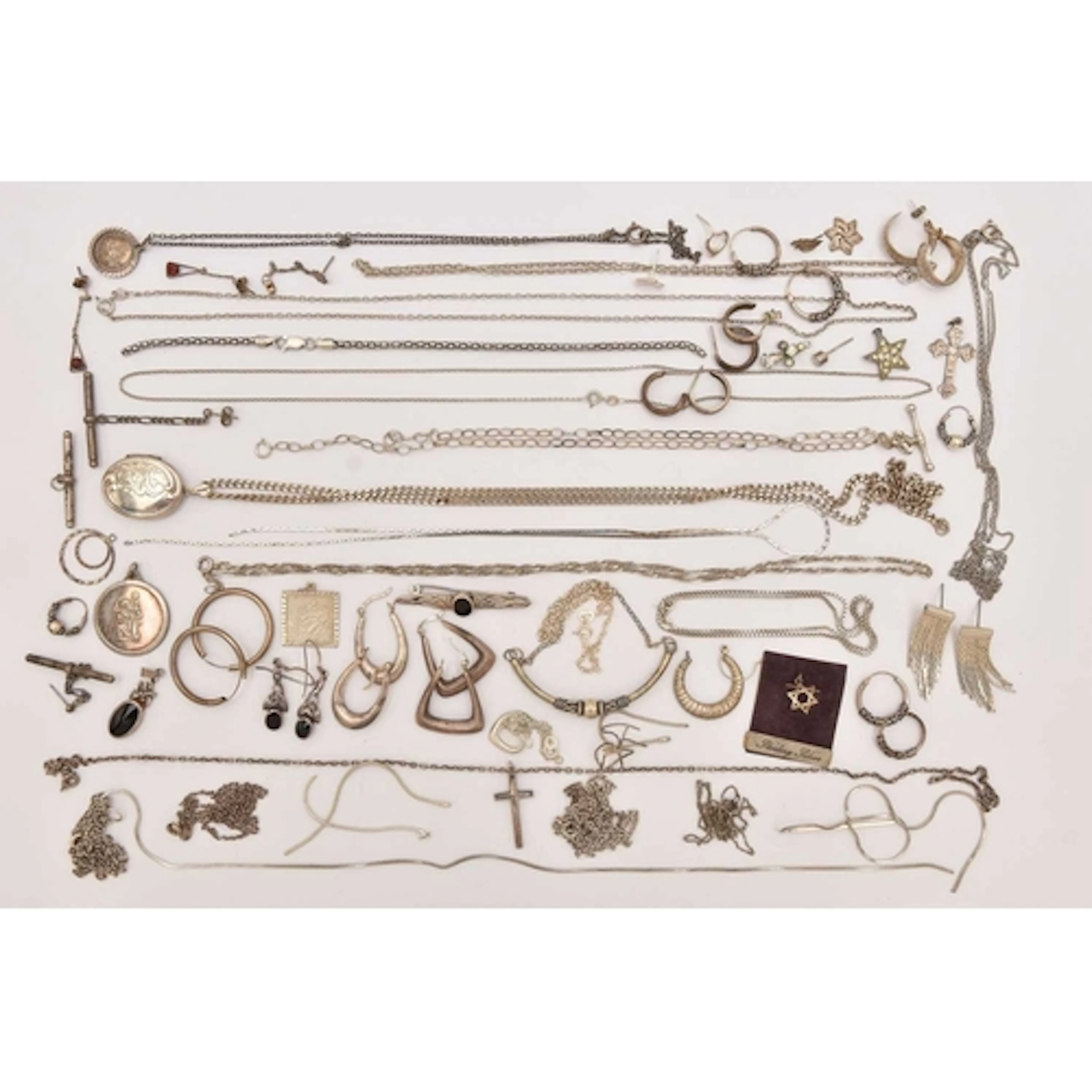 AN ASSORTMENT OF WHITE METAL JEWELLERY, to include earrings,...