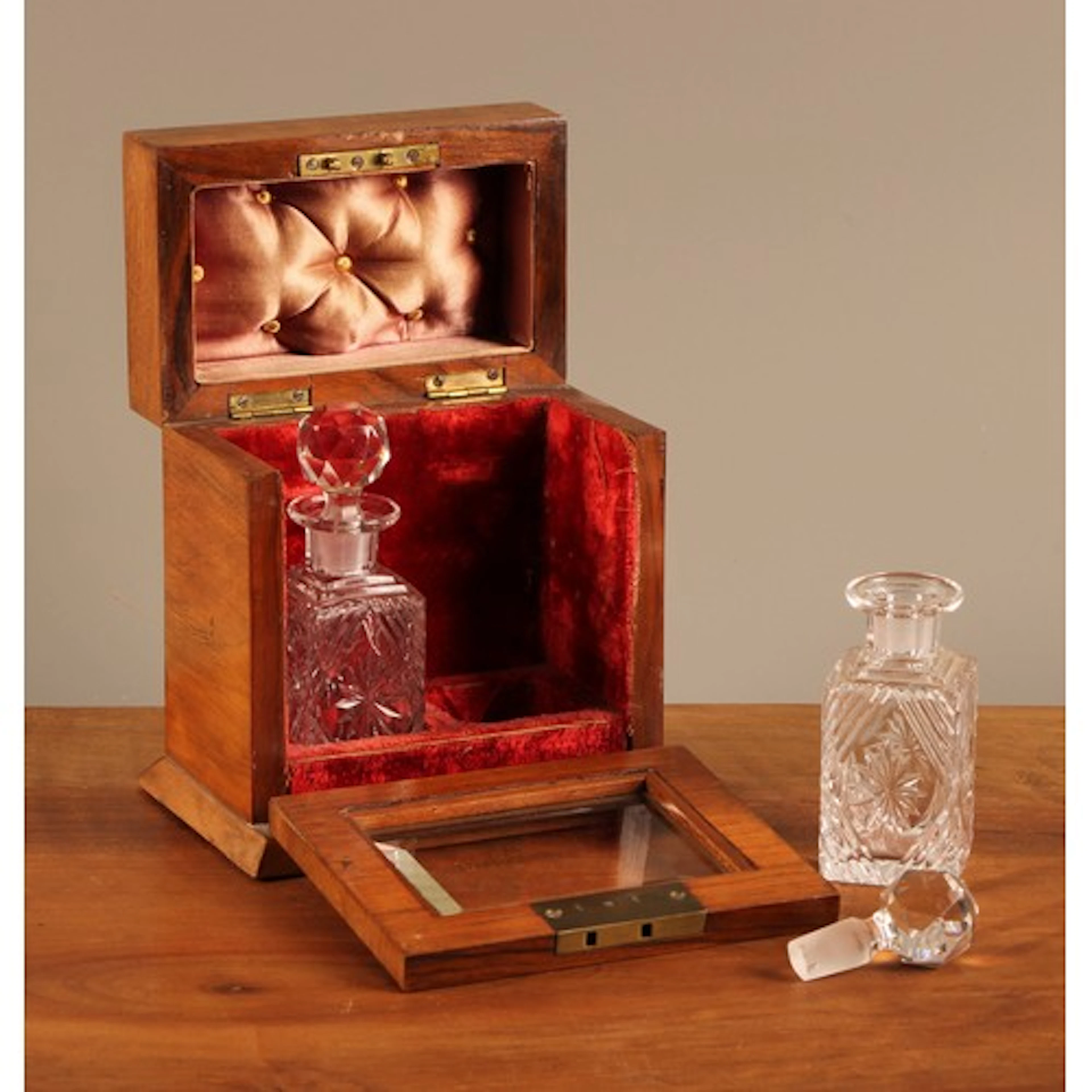 A Victorian walnut dressing table scent cabinet, hinged cove...